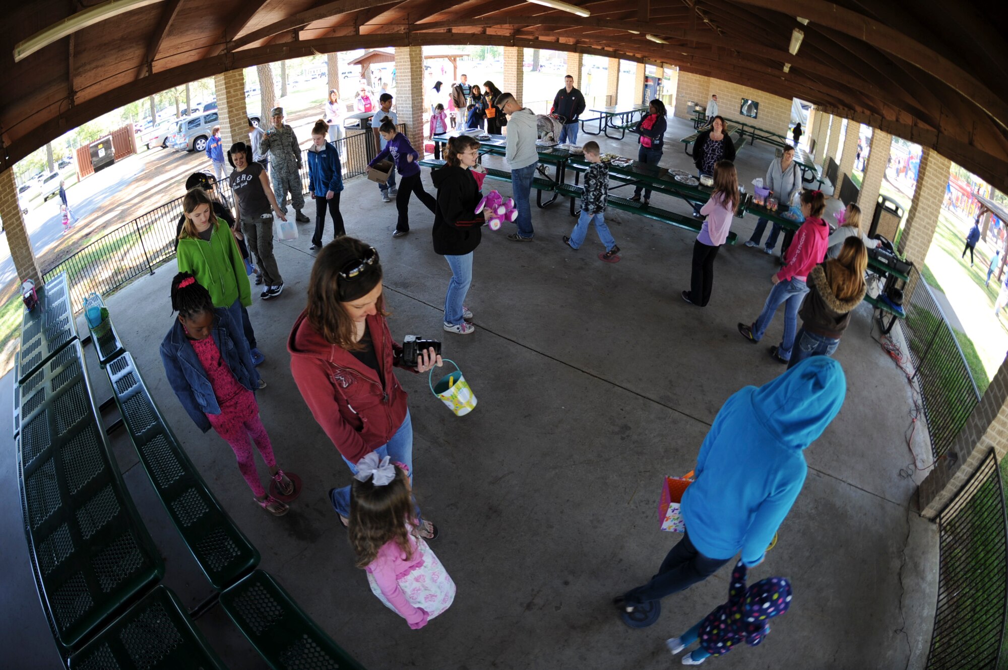 Children of 4th Fighter Wing Airmen participate in a cake walk during an Easter Egg Hunt at Debden Park on Seymour Johnson Air Force Base, N.C., April 7, 2012. The cake walk is a game where music plays as children walk in a circle, when it stops, a number is called and the winner receives a baked good. (U.S. Air Force photo/Airman 1st Class Aubrey Robinson/Released)