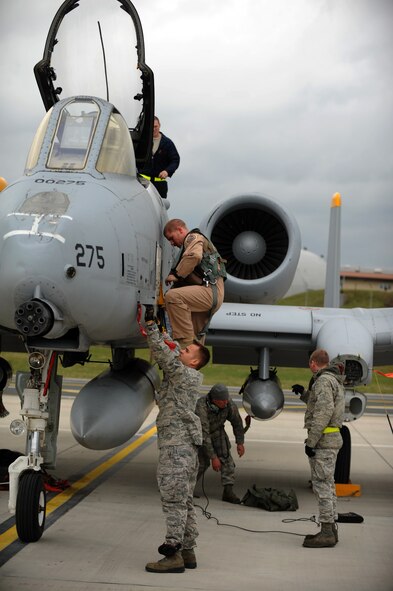 SPANGDAHLEM AIR BASE, Germany – Capt. Mike Krestyn, 81st Fighter Squadron pilot and chief of plans, climbs down from the cockpit of an A-10 Thunderbolt II on Ramp 4 here April 10. Krestyn was one of the squadron’s six pilots returning from a deployment from Bagram Airfield, Afghanistan, providing close air support during Operation Enduring Freedom. (U.S. Air Force photo/Airman 1st Class Matthew B. Fredericks)(Released)