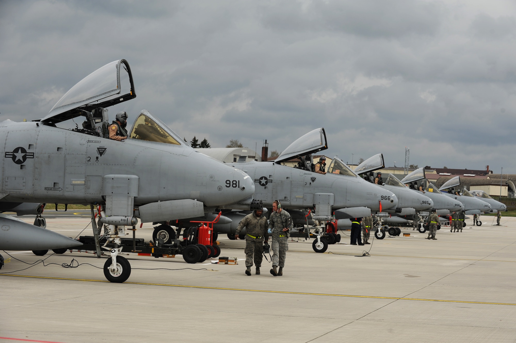 SPANGDAHLEM AIR BASE, Germany – A-10 Thunderbolt II pilots from the 81st Fighter Squadron prepare to exit their aircraft on Ramp 4 here April 10 after returning from a deployment to Bagram Airfield, Afghanistan. Friends and family waited by to greet six of the squadron’s pilots who had been providing close air support during Operation Enduring Freedom. (U.S. Air Force photo by Airman 1st Class Matthew B. Fredericks/Released)