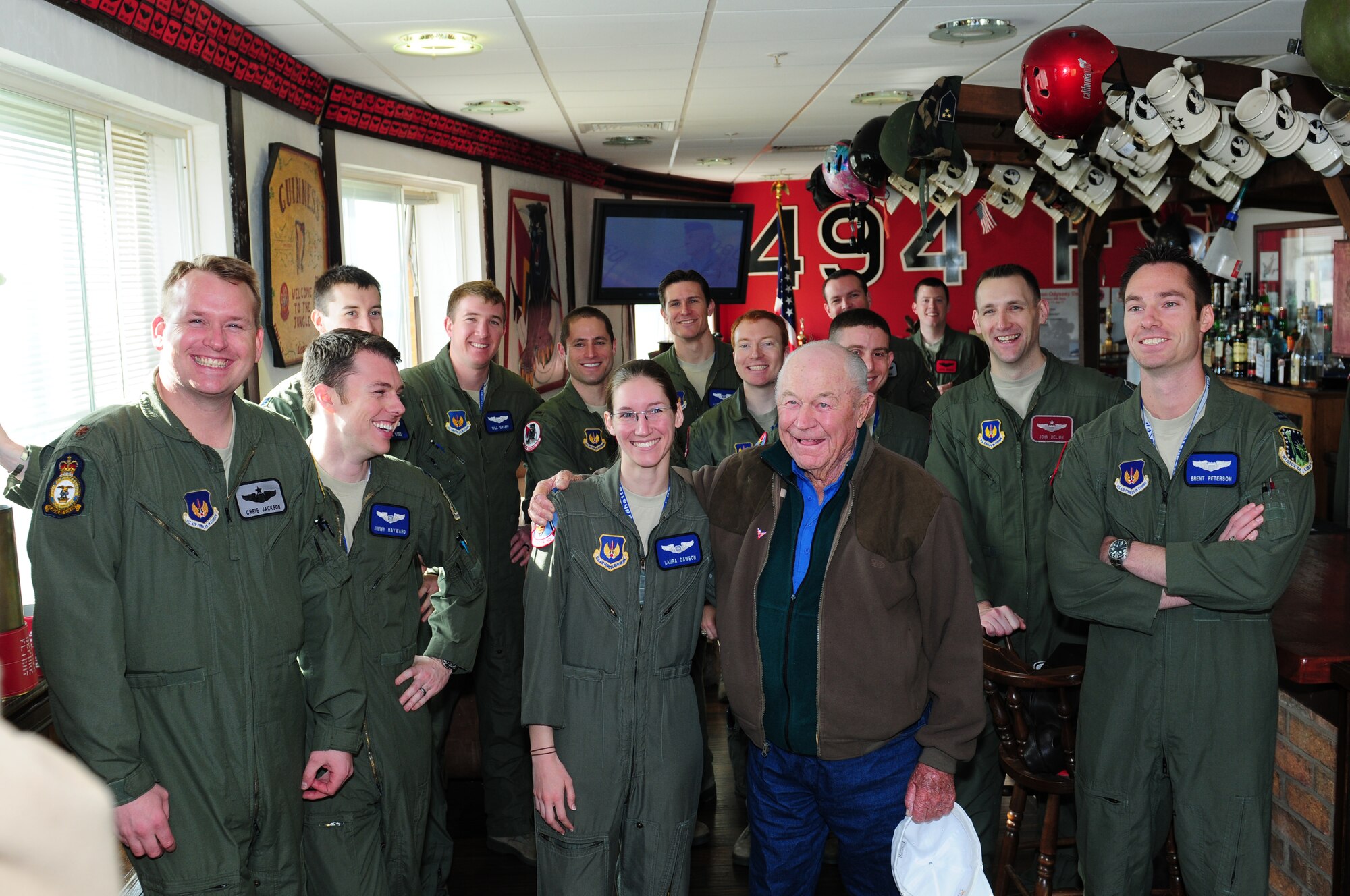 ROYAL AIR FORCE LAKENHEATH, England – Retired Brig. Gen. Charles E. “Chuck” Yeager visits with members of the 48th Operations Group in the 494th Fighter Squadron heritage room April 10, 2012.  Yeager visited the Liberty Wing to talk to Airmen about his Air Force career and experiences. (U.S. Air Force photo by Airman 1st Class Cory D. Payne)