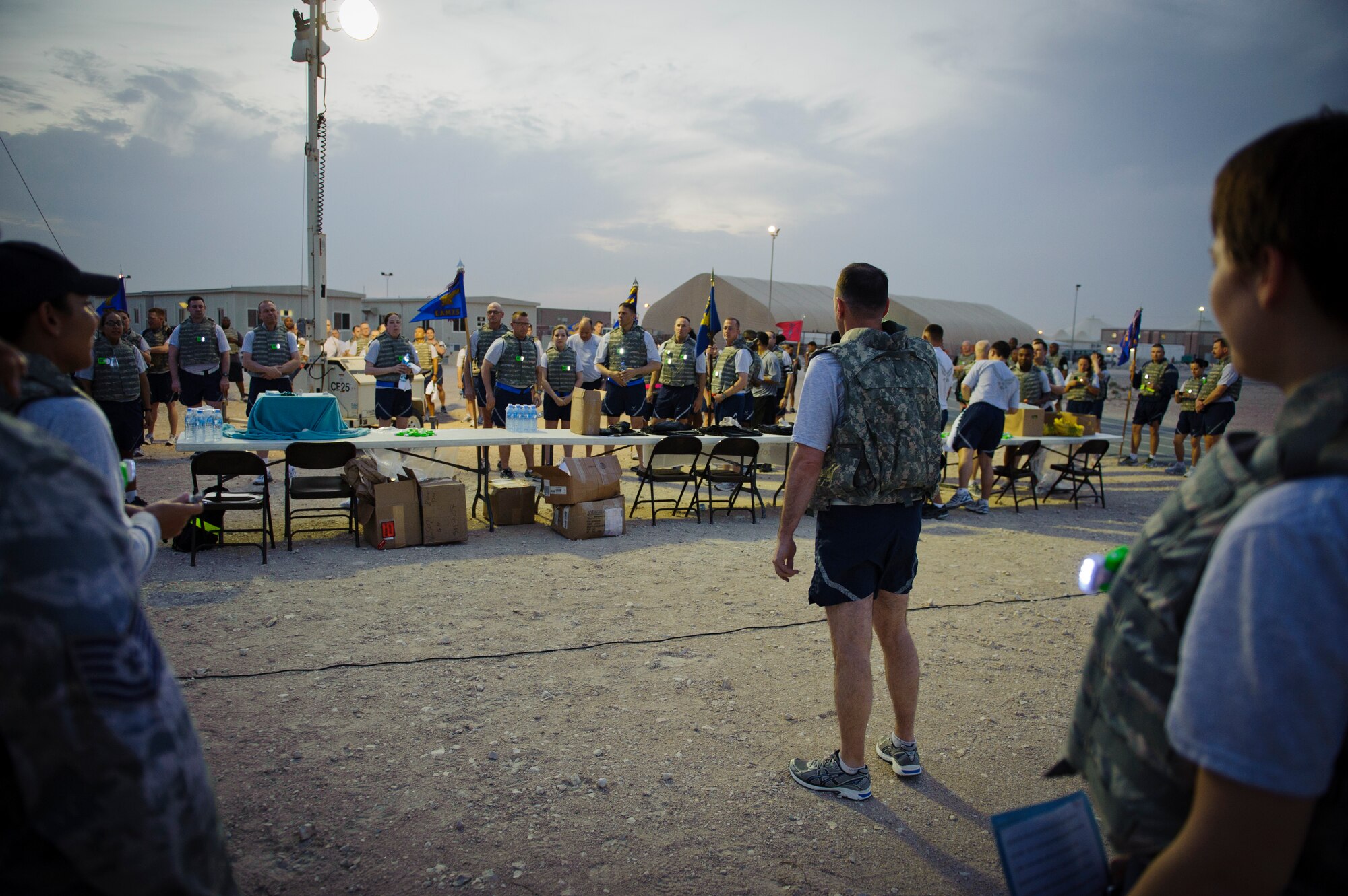 SOUTHWEST ASIA – Col. Kevin Kennedy, 379th Air Expeditionary Wing vice commander, speaks to attendees about sexual assault before the “We Own the Night” Flak Vest Walk here April 4, 2012. April is Sexual Assault Awareness Month, which is an annual campaign to raise public awareness on how to prevent sexual violence. (U.S. Air Force photo/Staff Sgt. Nathanael Callon)