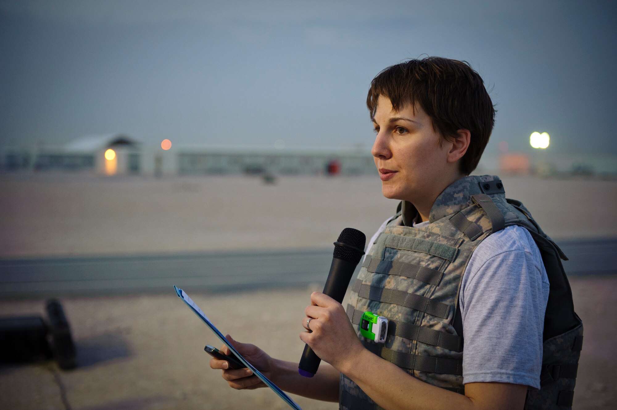 SOUTHWEST ASIA – Capt. Kristina Garuti, 379th Air Expeditionary Wing Sexual Assault Response Coordinator, speaks to attendees about sexual assault before the “We Own the Night” Flak Vest Walk here April 4, 2012. April is Sexual Assault Awareness Month, which is an annual campaign to raise public awareness on how to prevent sexual violence. (U.S. Air Force photo/Staff Sgt. Nathanael Callon)