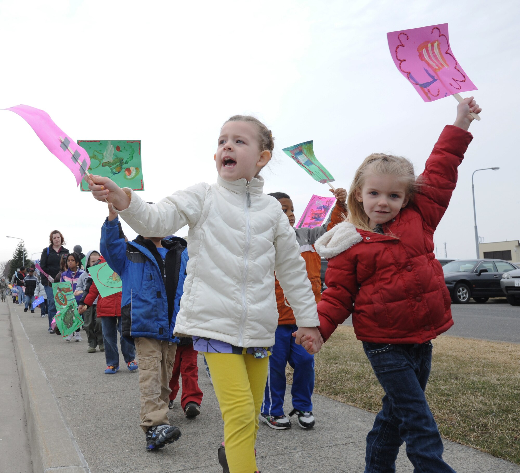 Children from the Yoiko Child Development Center march and chant to the Air Park during a “March with Pride” fun walk at Misawa Air Base, Japan, April 11, 2012. Next week, the CDC will be sponsoring “Spirit Week” where children will take part in several activities to celebrate the Month of the Military Child. (U.S. Air Force photo by Airman Kenna Jackson/Released)