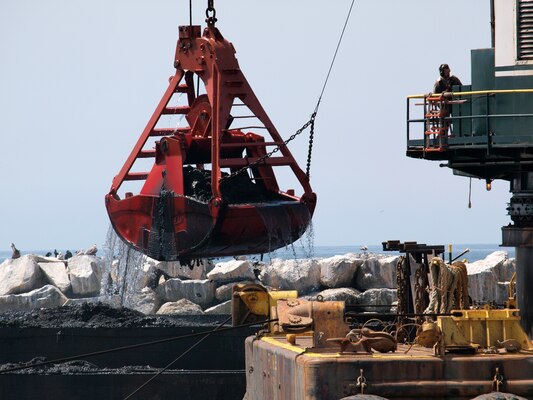 Dutra Dredging Company of San Rafael, Calif., uses the clamshell dredge Paula Lee to place about 520,000 cubic yards of the sand into barges that tugs will then transport to the Port of Long Beach for its Middle Harbor Redevelopment Project. The remaining sand will be used to renourish a segment of Redondo Beach. This sand will be placed just offshore at Dockweiler State Beach and Redondo Beach. 

