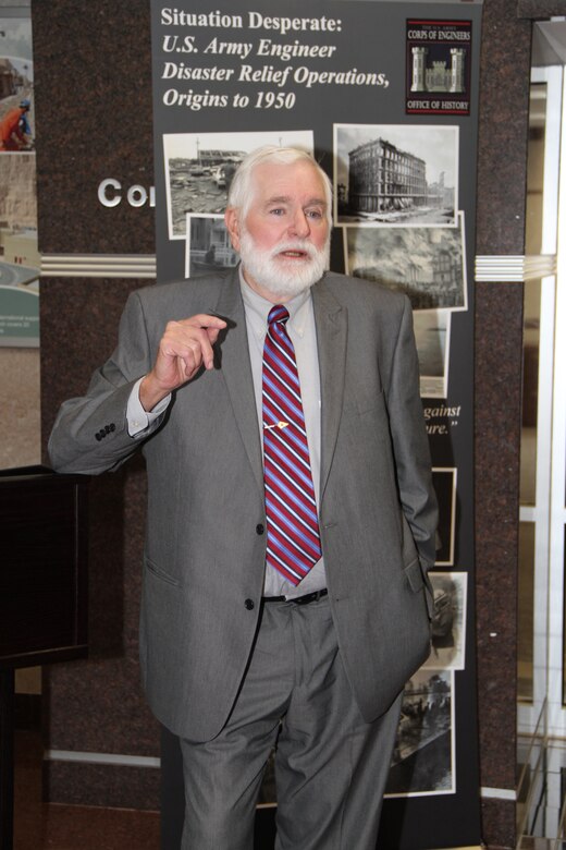 WASHINGTON — Leland Johnson addresses the crowd during the publication ceremony for "Situation Desperate: U.S. Army Corps of Engineers Disaster Relief Operations, Origins to 1950". Johnson is a freelance writer and researcher from Westmoreland, Tenn. The Office of History officially published the book in a ceremony at the U.S. Army Corps of Engineers Headquarters here, March 23, 2012.