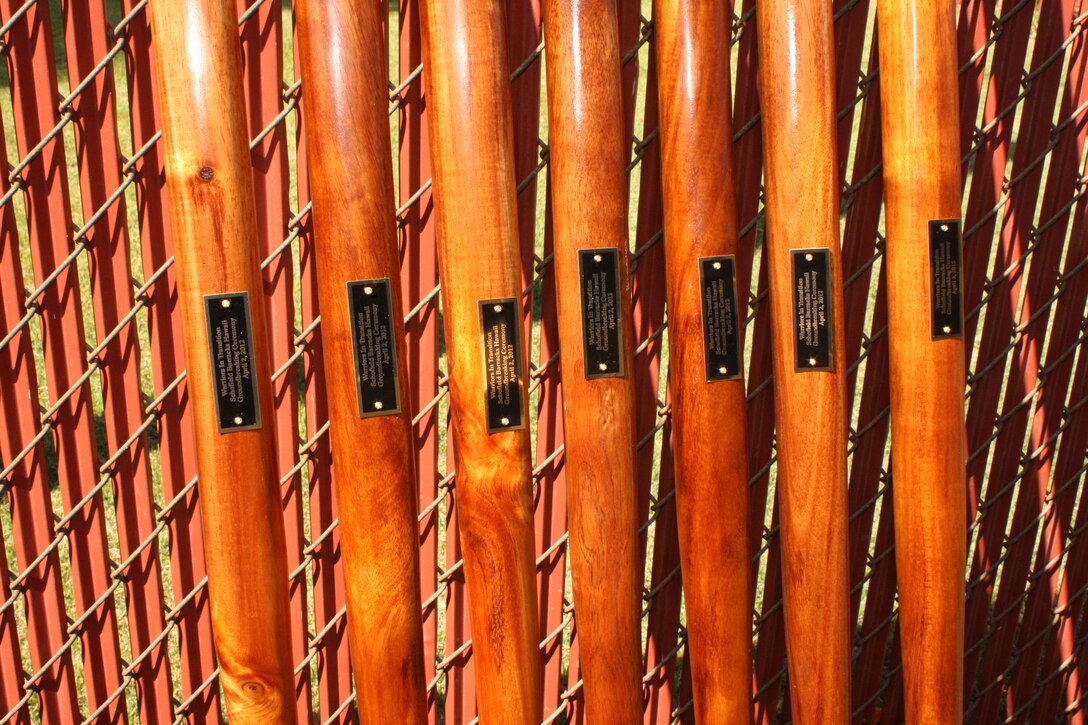 Seven Hawaiian `O'o sticks wait to be used to turn up the soil during a groundbreaking ceremony for the Warriors in Transition barracks and complex being built at Schofield Barracks on Oahu, Hawaii.