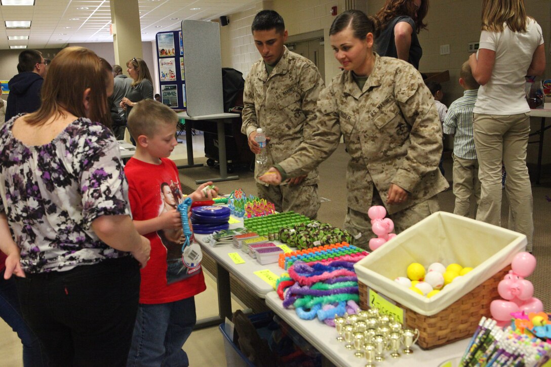 Children picked out prizes during the annual School of Infantry-East Spring Break Social, hosted at Ivy Hall aboard Camp Geiger, recently. The event was held to service members and their families.