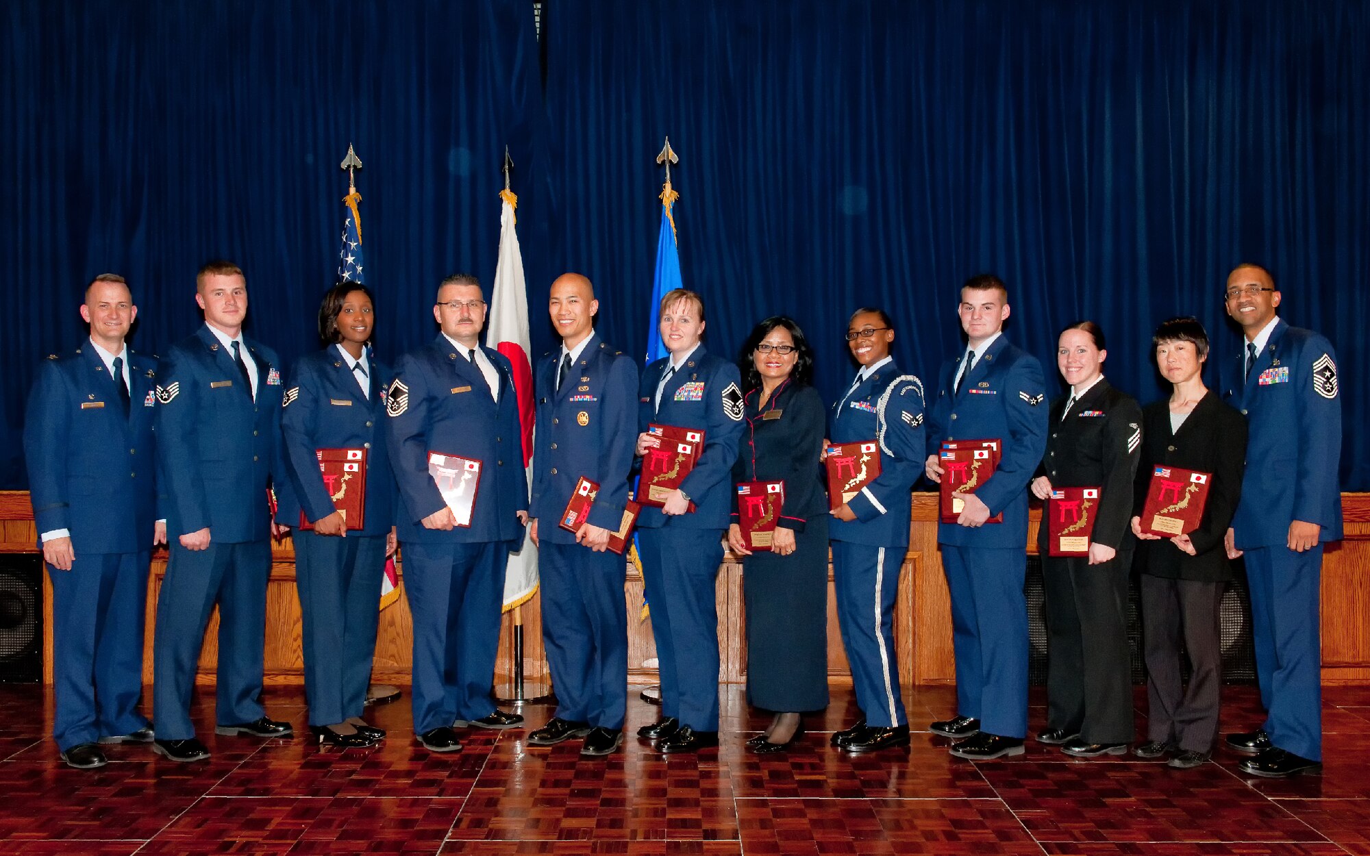 YOKOTA AIR BASE, Japan -- Winners of the 374th Airlift Wing Team Yokota First Quarterly Awards pose for a photo at the awards ceremony, April 12, 2012. (U.S. Air Force photo/Osakabe Yasuo)