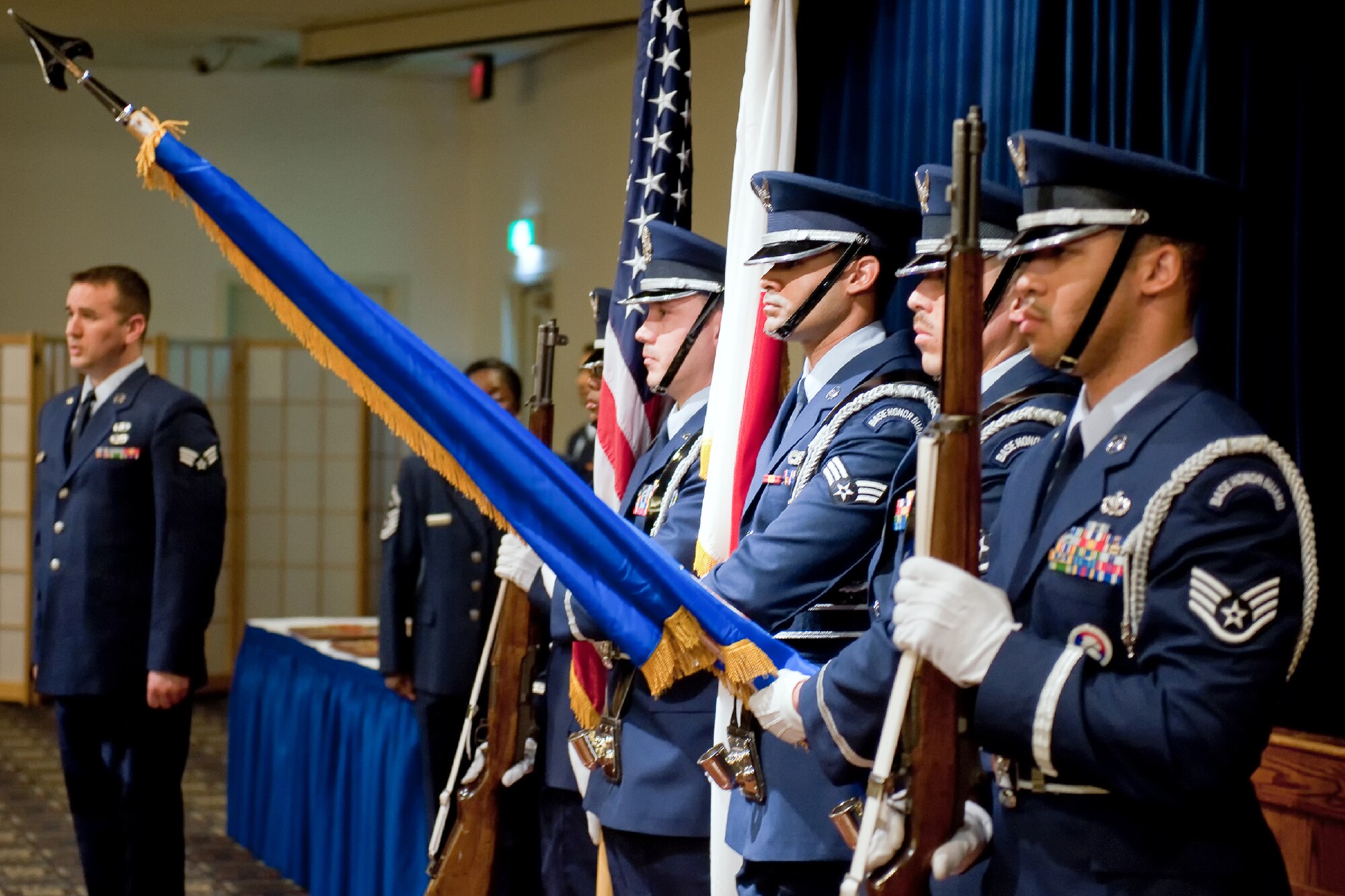 YOKOTA AIR BASE, Japan -- Yokota Air Base Honor Guard members post the colors during Team Yokota's First Quarterly Awards ceremony at Yokota Air Base, Japan, April 12, 2012. The Honor Guard performs various military ceremonial traditions throughout the year. (U.S. Air Force photo/Osakabe Yasuo)  