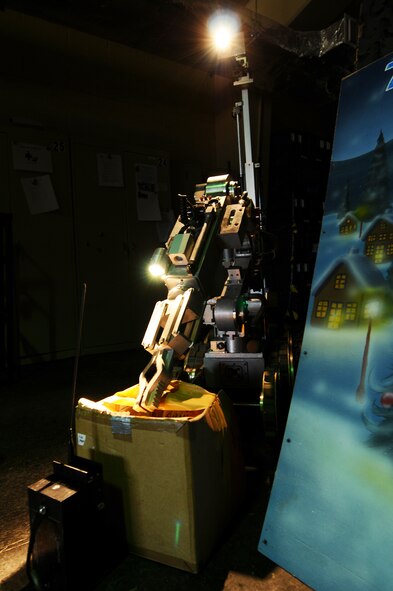ANDERSEN AIR FORCE BASE, Guam – A Explosive Ordnance Disposal robot opens a suspicious package during an exercise April 11. The robot is remotely driven, allowing EOD to work at a safe distance from the area of concern, while identifying the contents. (U.S. Air Force photo by Senior Airman Carlin Leslie)