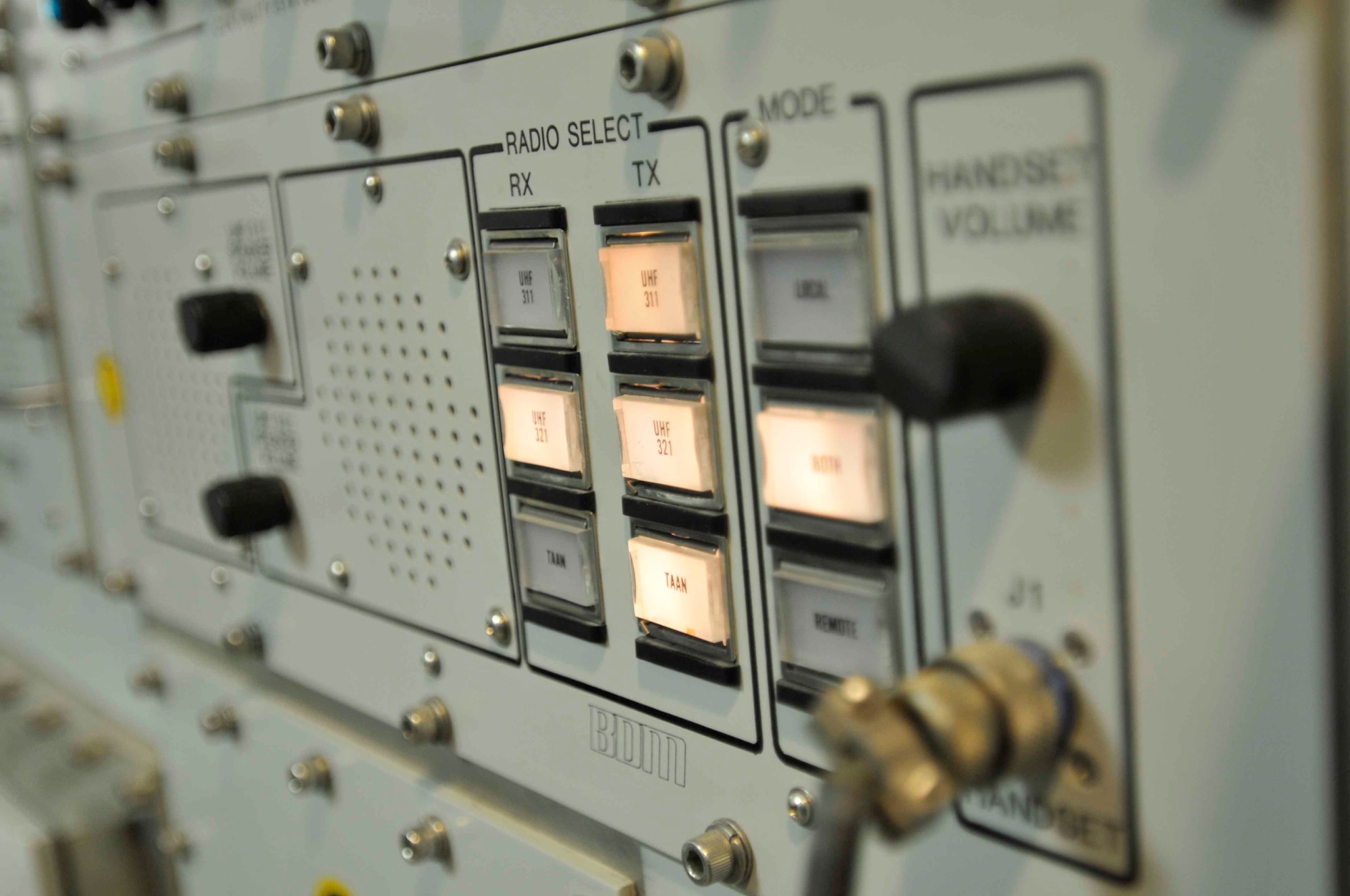 A radio control console in the command post’s panel objects flicker on as the mission ensues at Fairchild Air Force Base, Wash., recently. (U.S. Air Force photo by Staff Sgt. Johanna Brooks/Released)