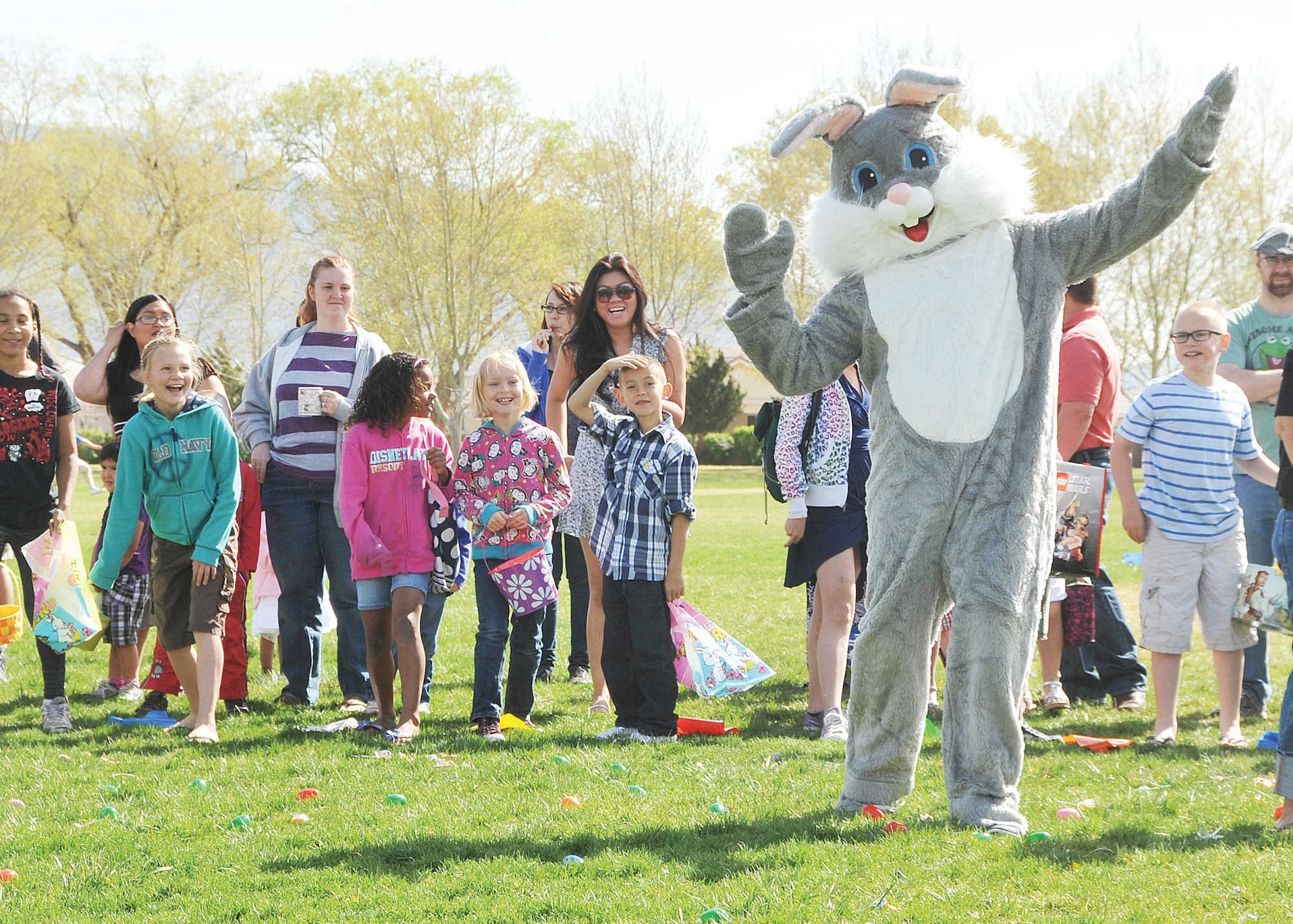 KIRTLAND AFB, N.M. – The Easter Bunny makes an appearance during the Kirtland Air Force Base Easter egg hunt at Hardin Field April 8. More than 100 children participated in the Easter egg hunt. (Photo by Todd Berenger)