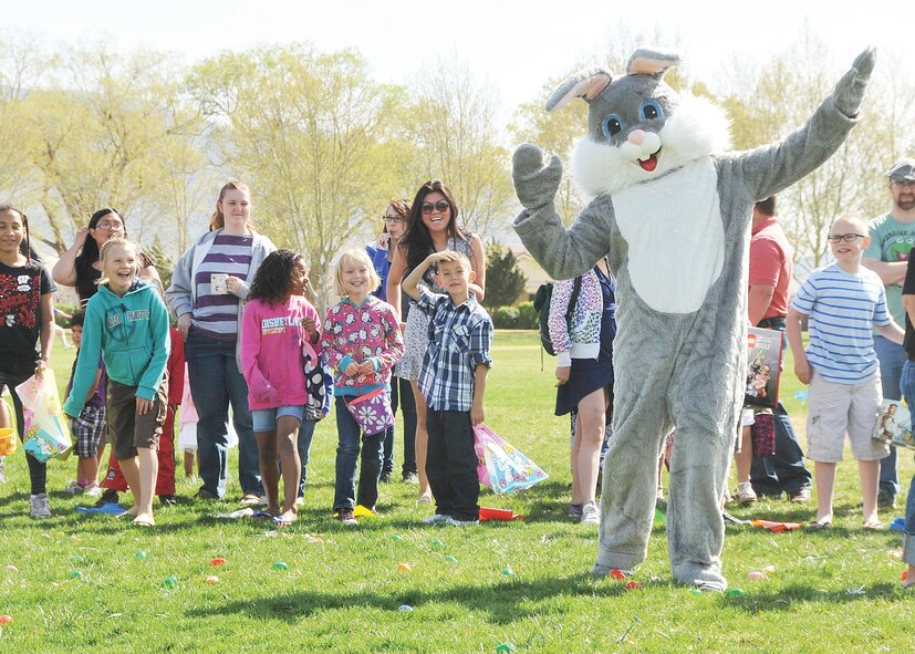 KIRTLAND AFB, N.M. – The Easter Bunny makes an appearance during the Kirtland Air Force Base Easter egg hunt at Hardin Field April 8. More than 100 children participated in the Easter egg hunt. (Photo by Todd Berenger)
