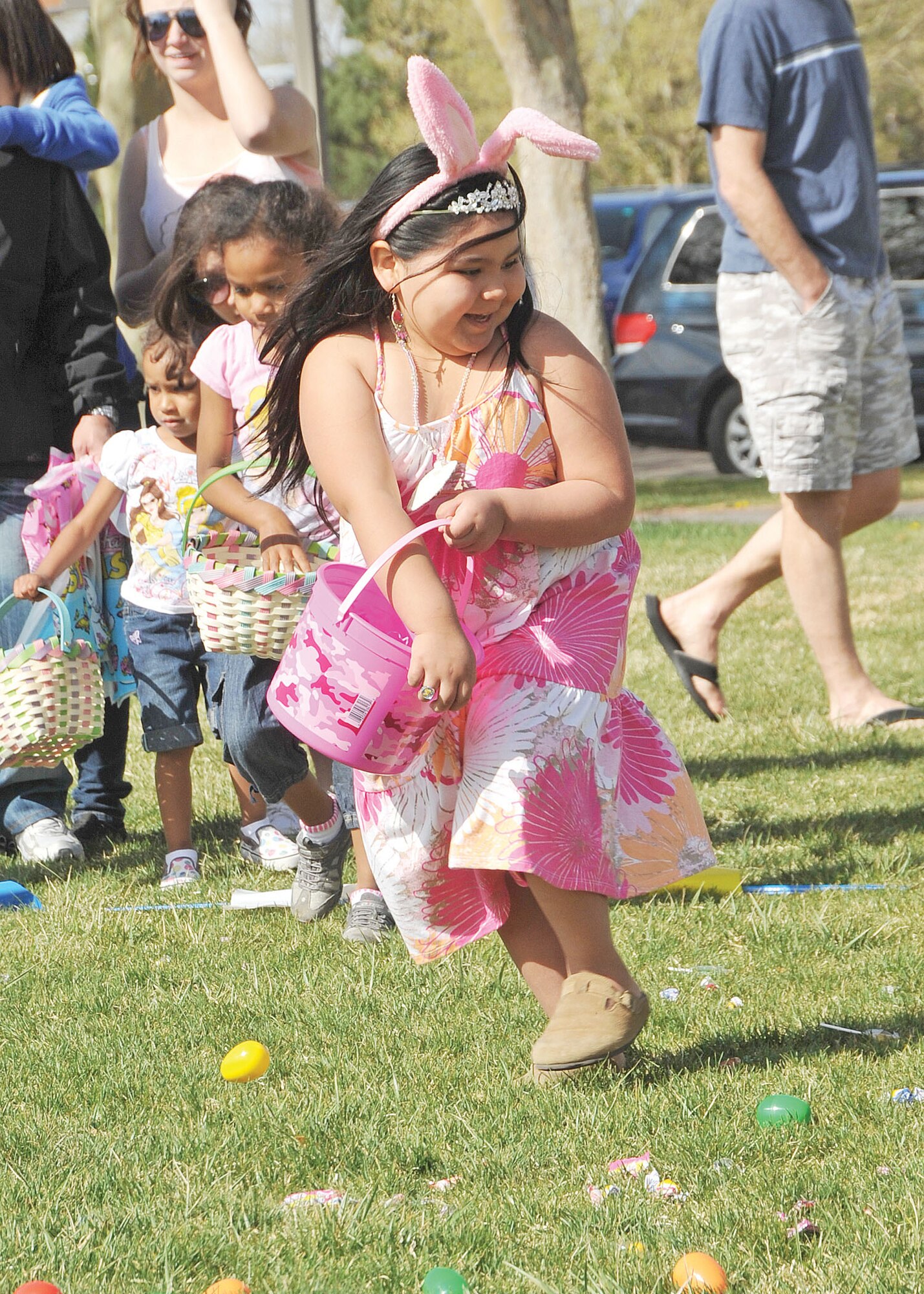 KIRTLAND AFB, N.M. -- More than 100 children collected hundreds of candy-filled eggs during the Kirtland Air Force Base Easter egg hunt at Hardin Field April 8. Other events included an egg-and-spoon race, a sack race and an appearance by the Easter Bunny. (Photo by Todd Berenger)