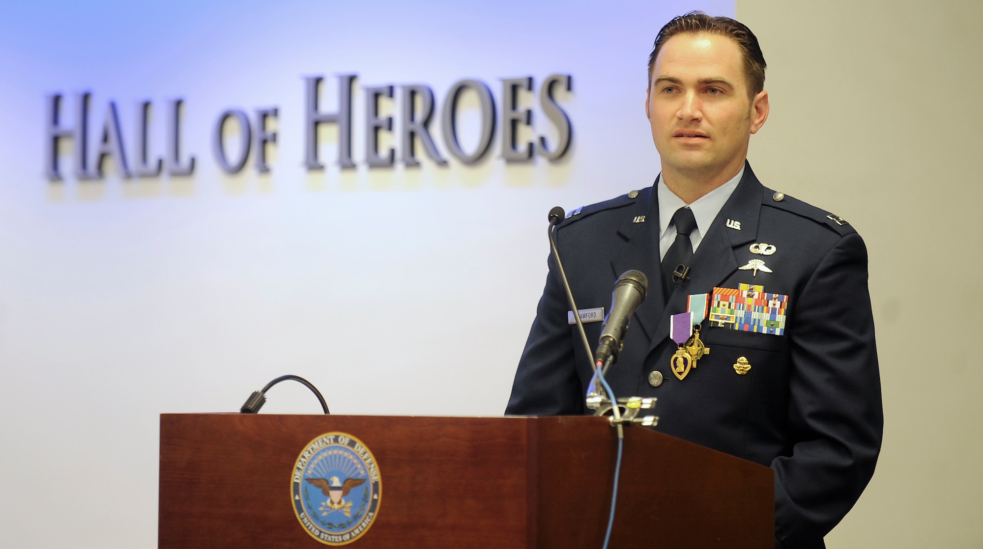 Capt. Barry Crawford speaks after Air Force Chief of Staff Gen. Norton Schwartz presented him with the Air Force Cross and Purple Heart during a ceremony in the Pentagon's Hall of Heroes in Washington, D.C., on April 12, 2012.  (U.S. Air Force photo/Andy Morataya)