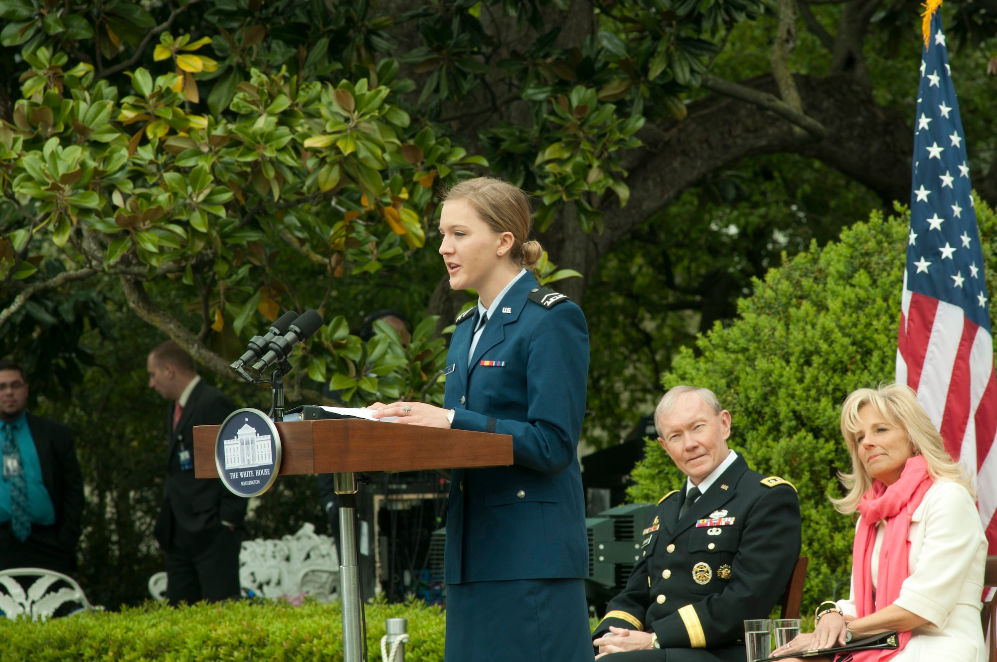 Cadet Staff Sgt. Moranda Hern, Air Force Academy sophomore, speaks as Chairman of the Joint Chiefs of Staff U.S. Army Gen. Martin E. Dempsey; Jill Biden, the vice-president’s wife; First Lady Michelle Obama; and Tom Brokaw, television journalist, listen at the first anniversary of Joining Forces ceremony on the south lawn of the White House April 11, 2012.  Hern was one of the 20 finalists in the Joining Forces Community Challenge that recognized citizens, communities and organizations for their efforts in supporting military families. .  Hern started the Sisterhood of the Traveling BDUs organization that aims to help daughters ages 13-18 of military members connect and build relationships.  The challenge was part of the Joining Forces program, pioneered by First Lady Michelle Obama and Jill Biden, which is a national initiative that mobilizes all sectors of society to support military members and their families. (Air Force photo by Tech. Sgt. Jess D. Harvey)
