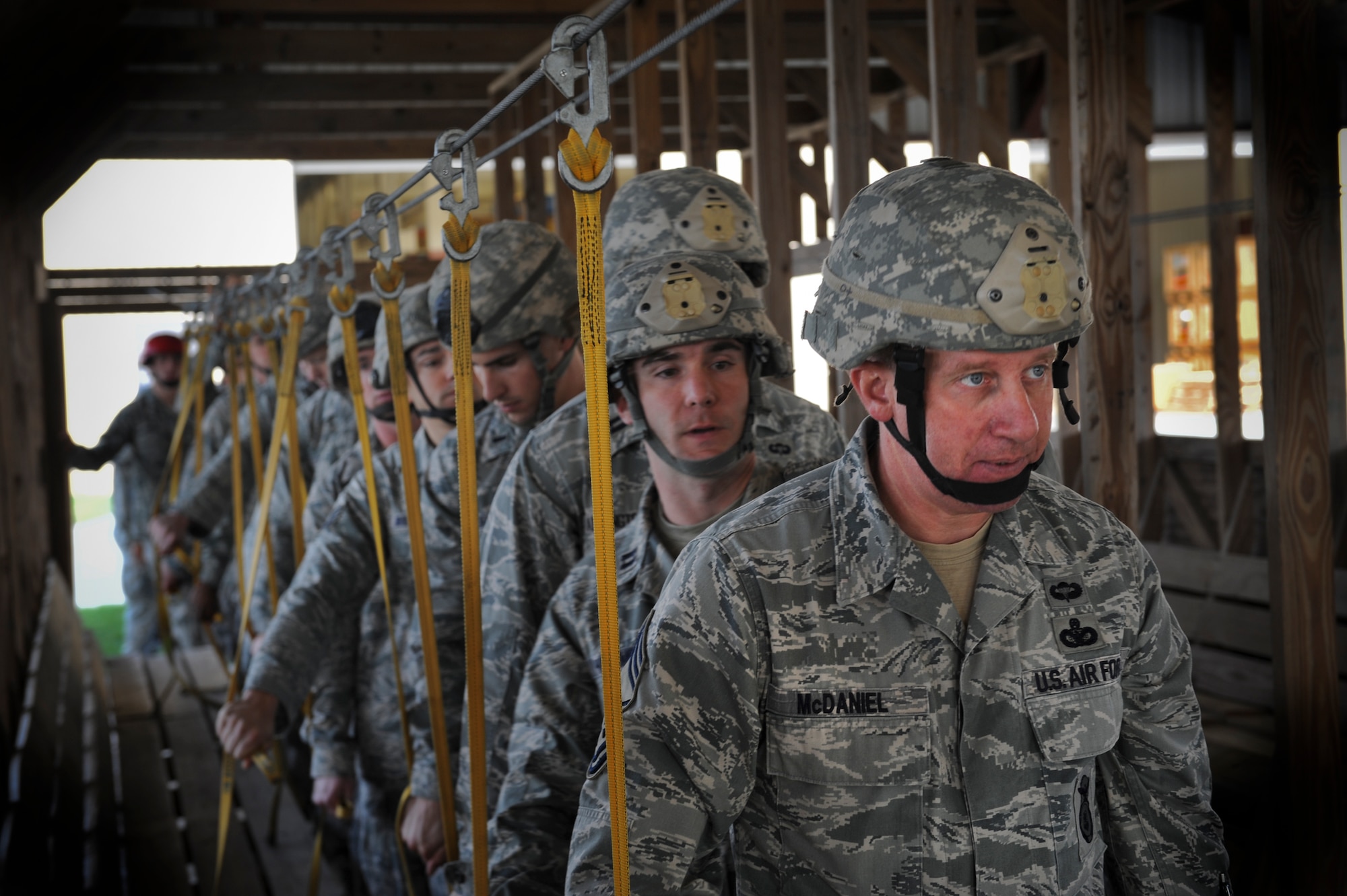 U.S. Air Force Chief Master Sgt. Tommy McDaniel, 820th Base Defense Group, stands in line during jump training at Moody Air Force Base Ga., March 21, 2012. During this training, the Airmen practiced the correct way to jump out of an HC-130P Combat King. (U.S. Air Force photo by Airman 1st Class Douglas Ellis/Released)
