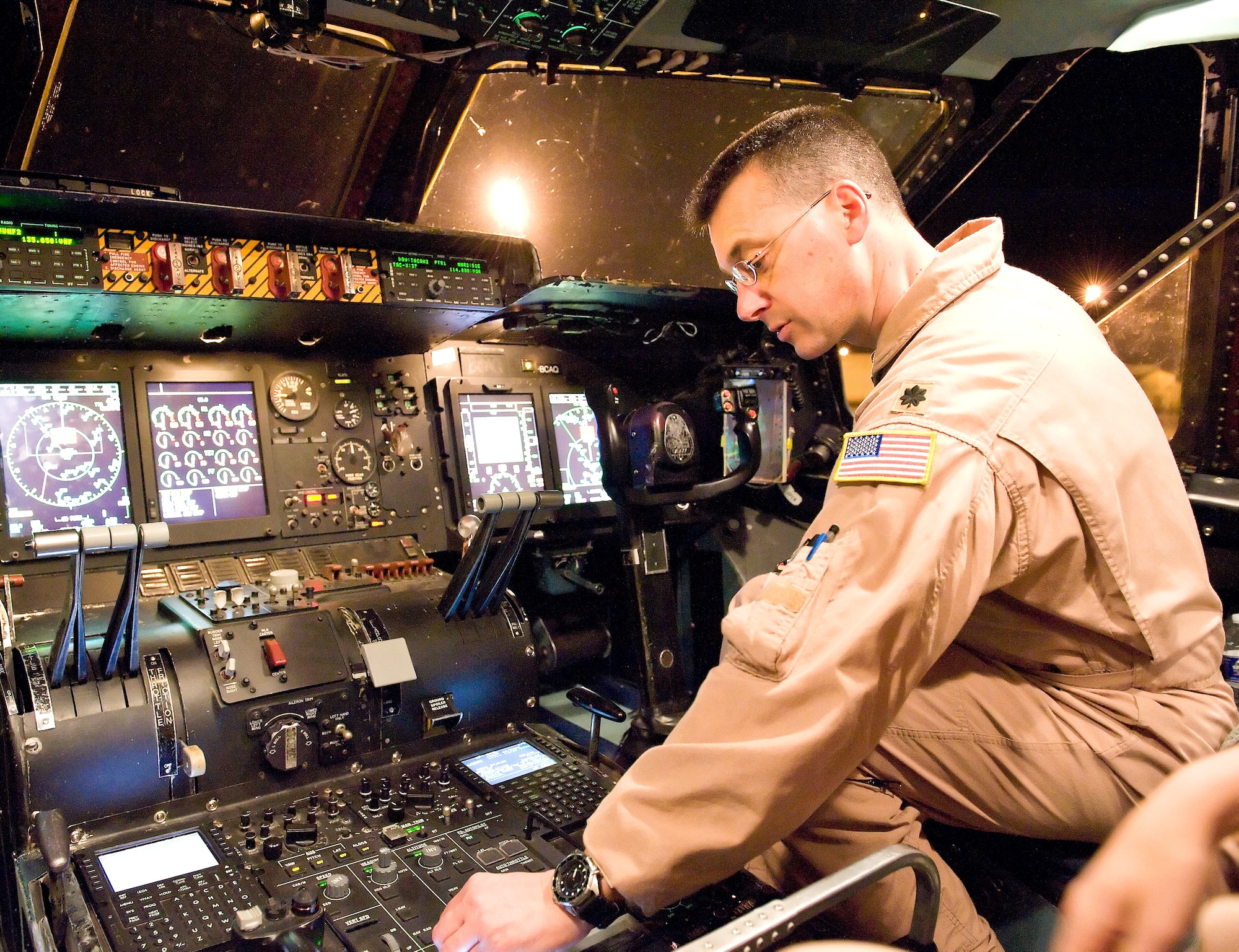 Lt. Col. Richard Ciaramella, a pilot with the 9th Airlift Squadron, configures the pilot's center console control panel switches on a C-5B Galaxy aircraft prior to takeoff March 8, 2012, at Dover Air Force Base, Del. Ciaramella was one of five pilots assigned to the last active-duty C-5B mission flown out of Dover AFB. The 9th Airlift Squadron will now exclusively use the C-5M Super Galaxy for local training, state-side and overseas missions.  (U.S. Air Force photo by Roland Balik)