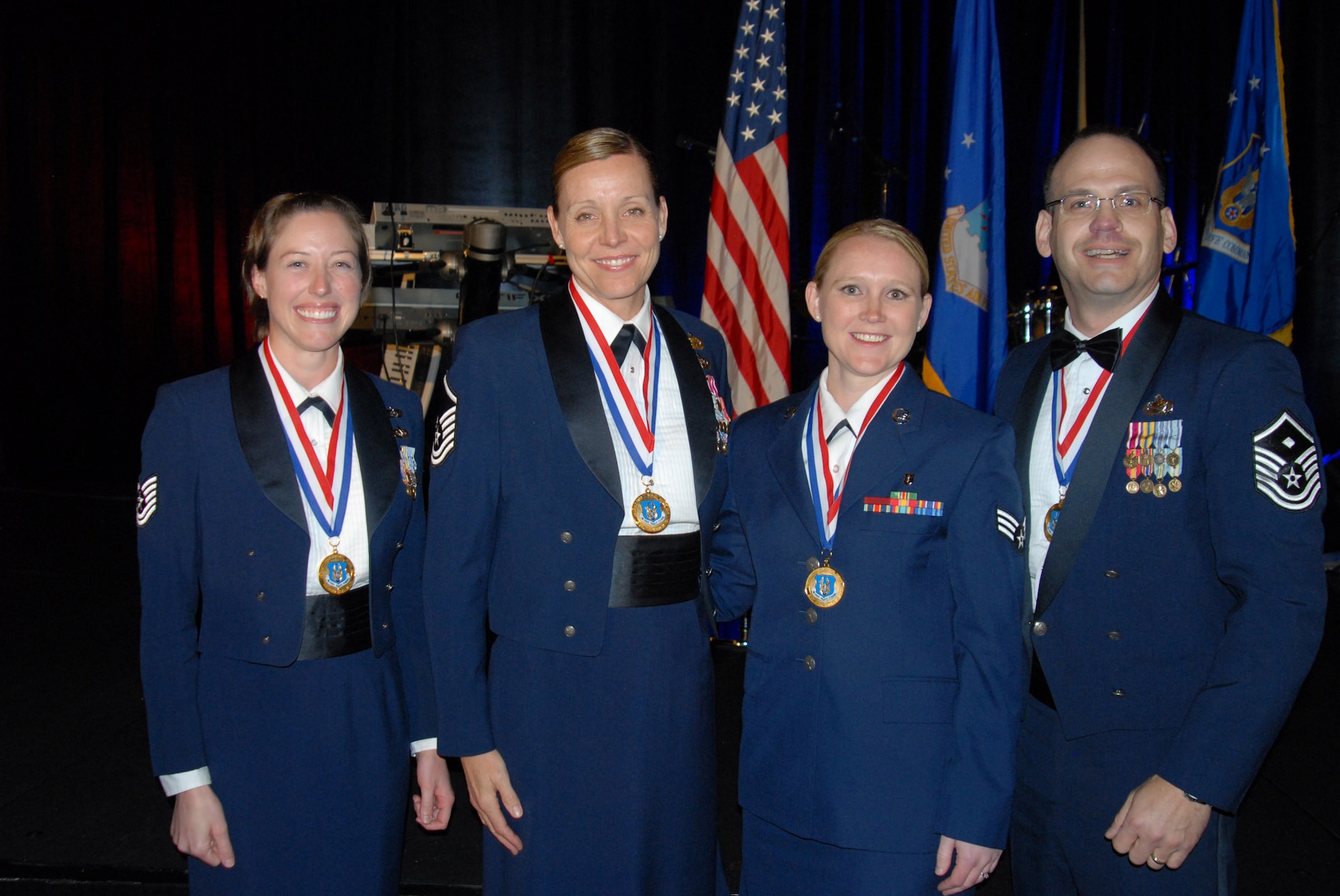 Air Force Reserve Command’s Outstanding Airmen of 2011, from left, NCO category: Tech. Sgt. Megan J. Legacy, 931st Civil Engineer Squadron, McConnell Air Force Base, Kan.; Senior NCO category: Master Sgt. Sandra L. Plentzas, 944th Fighter Wing, Luke AFB, Ariz.; Airman category: Senior Airman Merranda J. Moreno, 944th Aeromedical Staging Squadron, Luke AFB, Ariz.; First Sergeant category:  Master Sgt. Anthony G. Johns, 445th Operations Support Squadron, Wright-Patterson AFB, Ohio. (Air Force photo/Master Sgt. Chance Babin)