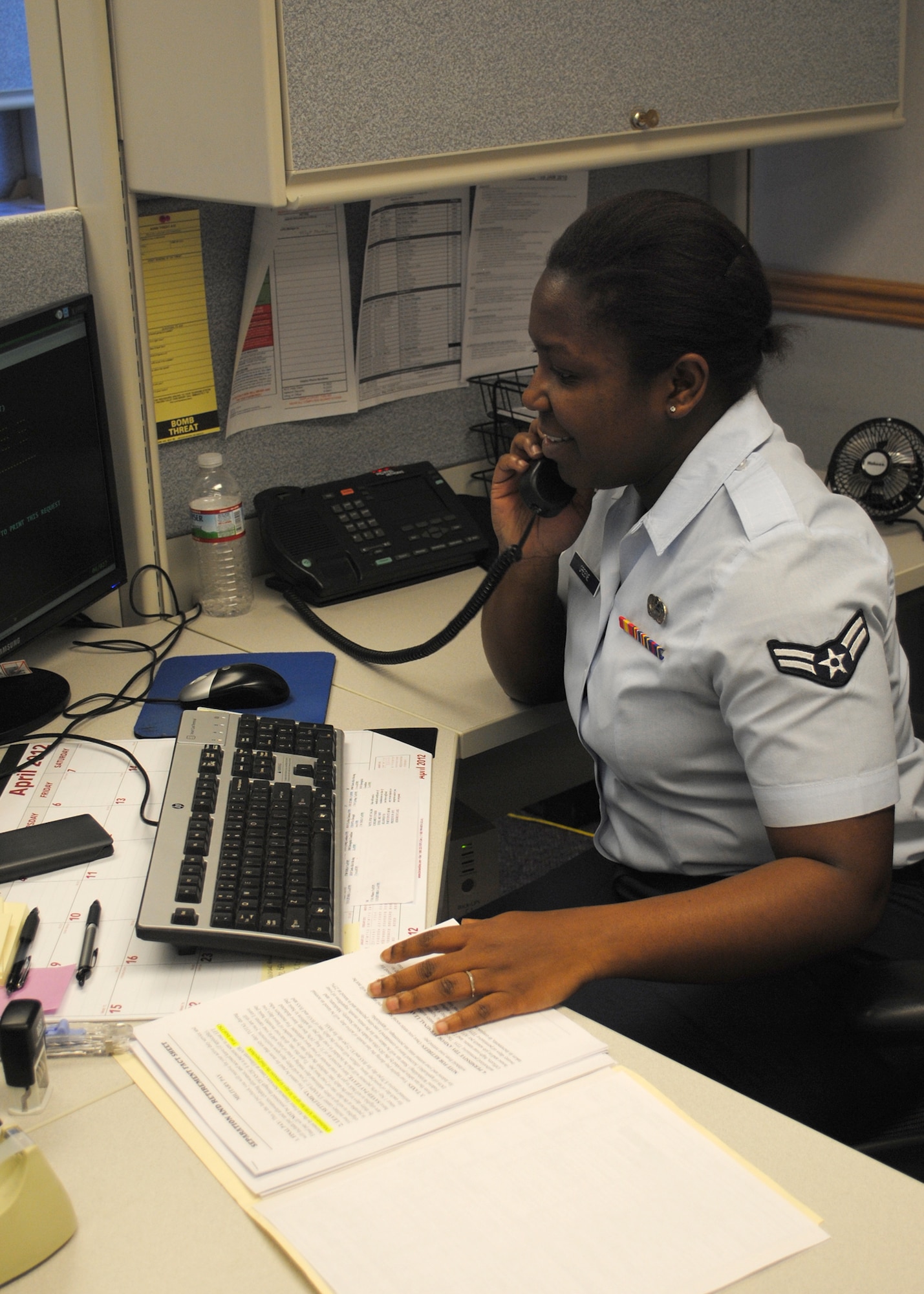 Airman 1st Class Sherry Greene, 341st Comptroller Squadron finance technician, assists a customer via phone with defense travel system issues. (U.S. Air Force photo/Airman 1st Class Cortney Paxton)