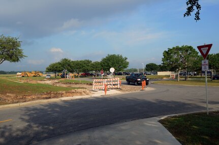 Construction begins on a new road connecting 4th Street and Perimeter Road on Joint Base San Antonio-Randolph April 11.  ( U.S. Air Force Photo by Don Lindsey)