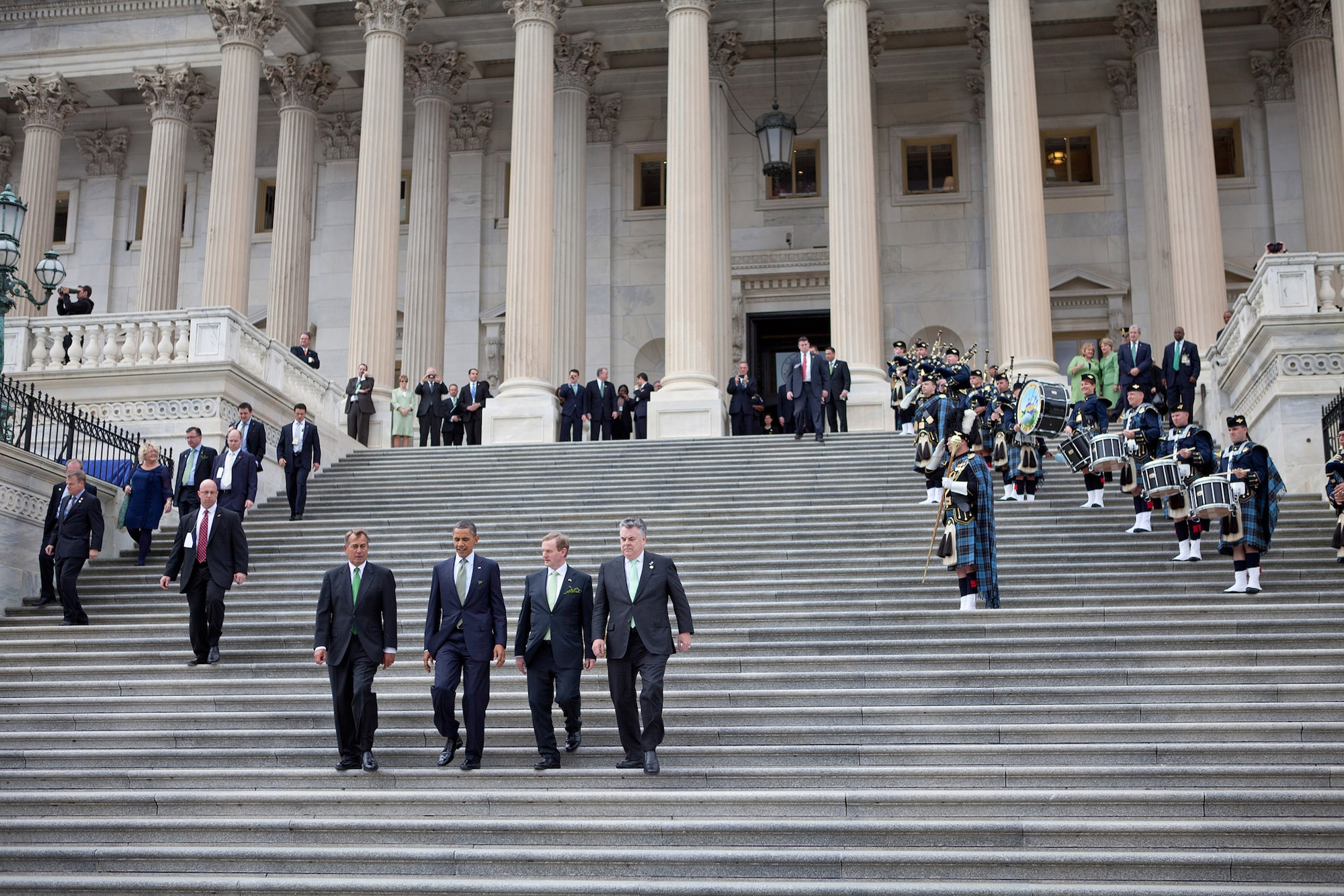 President Barack Obama walks down the steps with Prime Minister (Taoiseach) Enda Kenny of Ireland, House Speaker John Boehner and Rep. Peter King at the U.S. Capitol in Washington, D.C., March 20, 2012. The Band of the Air Force Reserve Pipe Band performed throughout the day's events, including the traditional walk down the capitol steps. (Official White House Photo by Sonya N. Hebert)