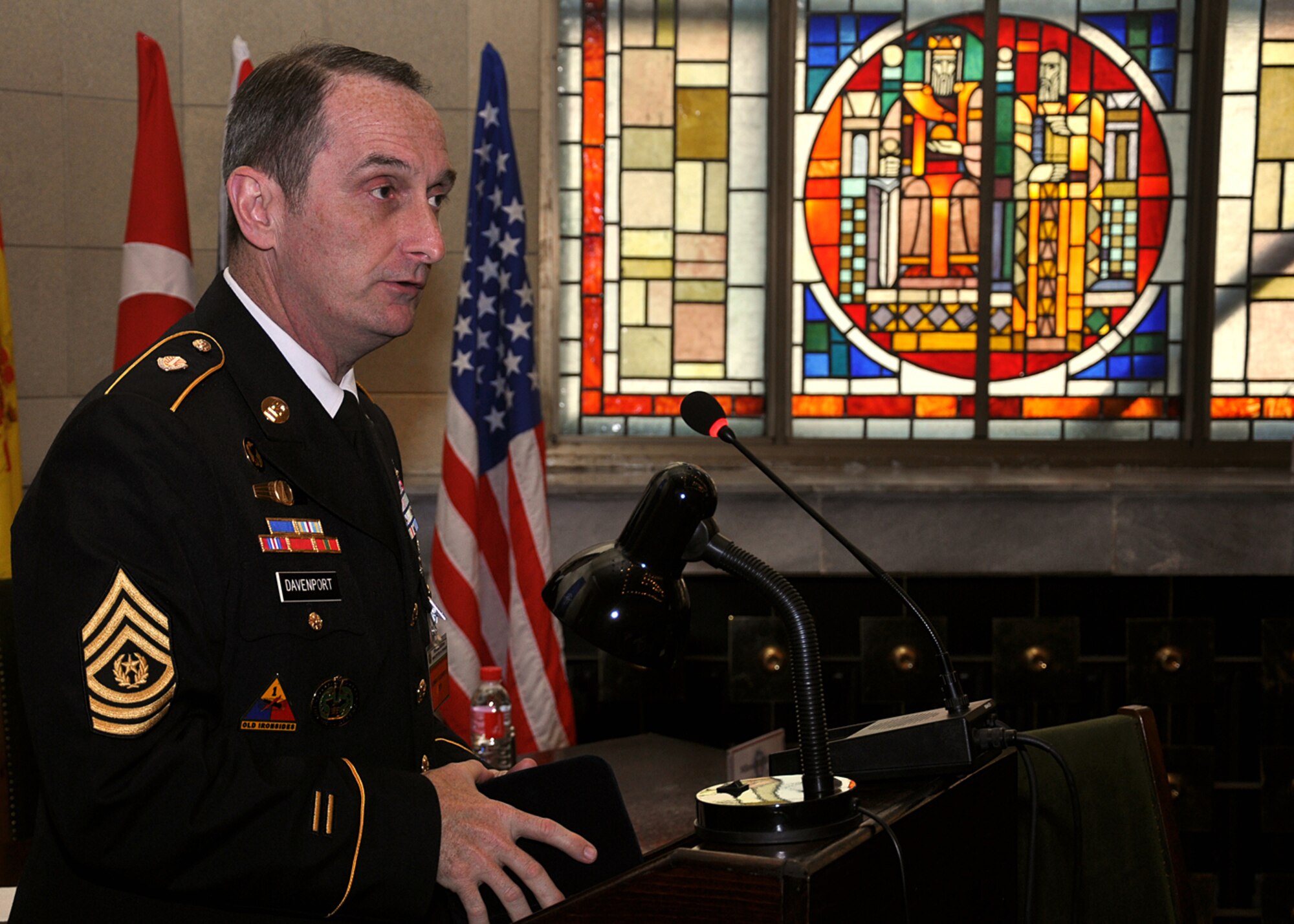 U.S. Army Europe Command Sgt. Maj. David Davenport Sr. speaks with more than 40 senior leaders during the first Bulgarian and U.S. non-commissioned officer symposium at the Bulgarian Land Forces headquarters here, April 10-11. Davenport highlighted the roles of U.S. command sergeants major. The senior enlisted leaders met to discuss doctrine, strengths and leadership philosophies, which are designed to empower and inspire non-commissioned officers in both nations' corps. The first day of the joint-nation symposium included four discussions and a small-group breakout session.