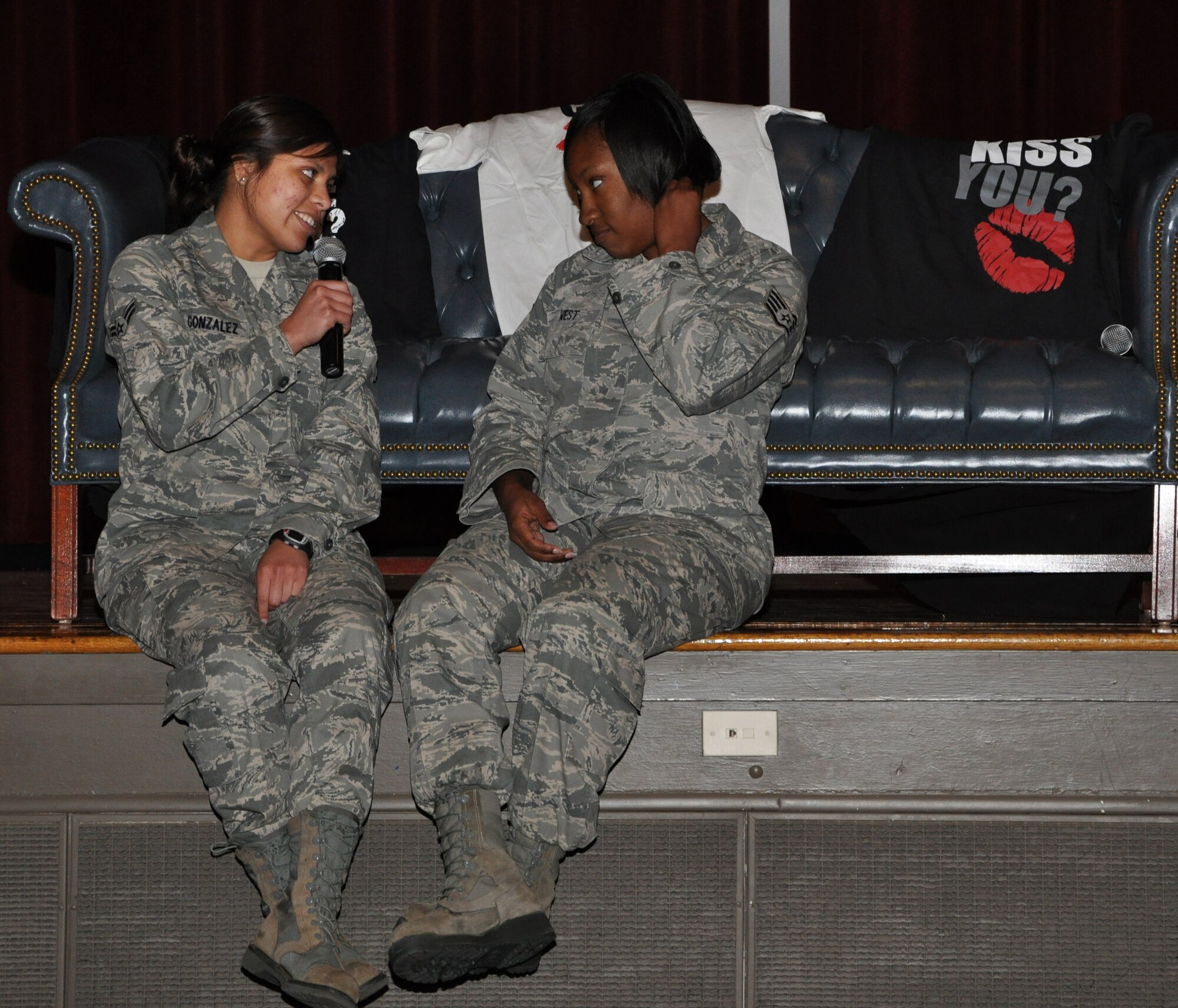 Two base Airmen roleplay a dating scenario, with one asking the other for a kiss, at the base theater April 11, 2012, at Little Rock Air Force Base, Ark. The scenario was part of the "Can I Kiss You?" presentation, intended to showcase topical issues for Sexual Assault Awareness and Prevention month, including the importance of asking for permission and having empathy and concern for others. (U.S. Air Force photo by Staff Sgt. Jacob Barreiro)