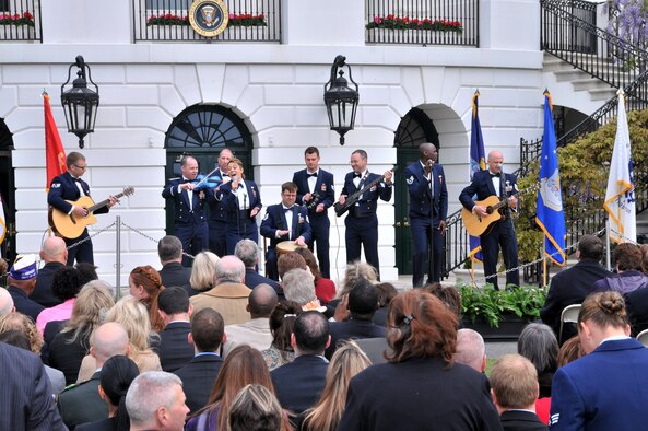 Sidewinder band members Air Force Staff Sgt. Sean Navarro; Staff Sgt. Ransom Miller; Staff Sgt. Devin LaRue; Staff Sgt. Brian Owens; Tech. Sgt. John Cavanaugh; Staff Sgt. Toby Callaway; Tech. Sgt. Kevin Maret; and Tech. Sgt. Joey Castilleja, perform at the White House on the South Lawn April 11, 2012. Sindwinder, the St. Louis, Mo.-based 571st Missouri Air National Guard Band made famous by their YouTube video performance of Adele's "Rolling in the Deep" is part of the 131st Bomb Wing out of Lambert Air National Guard Base-St. Louis. (Air National Guard hoto by Senior Master Sgt. Mary-Dale Amison)