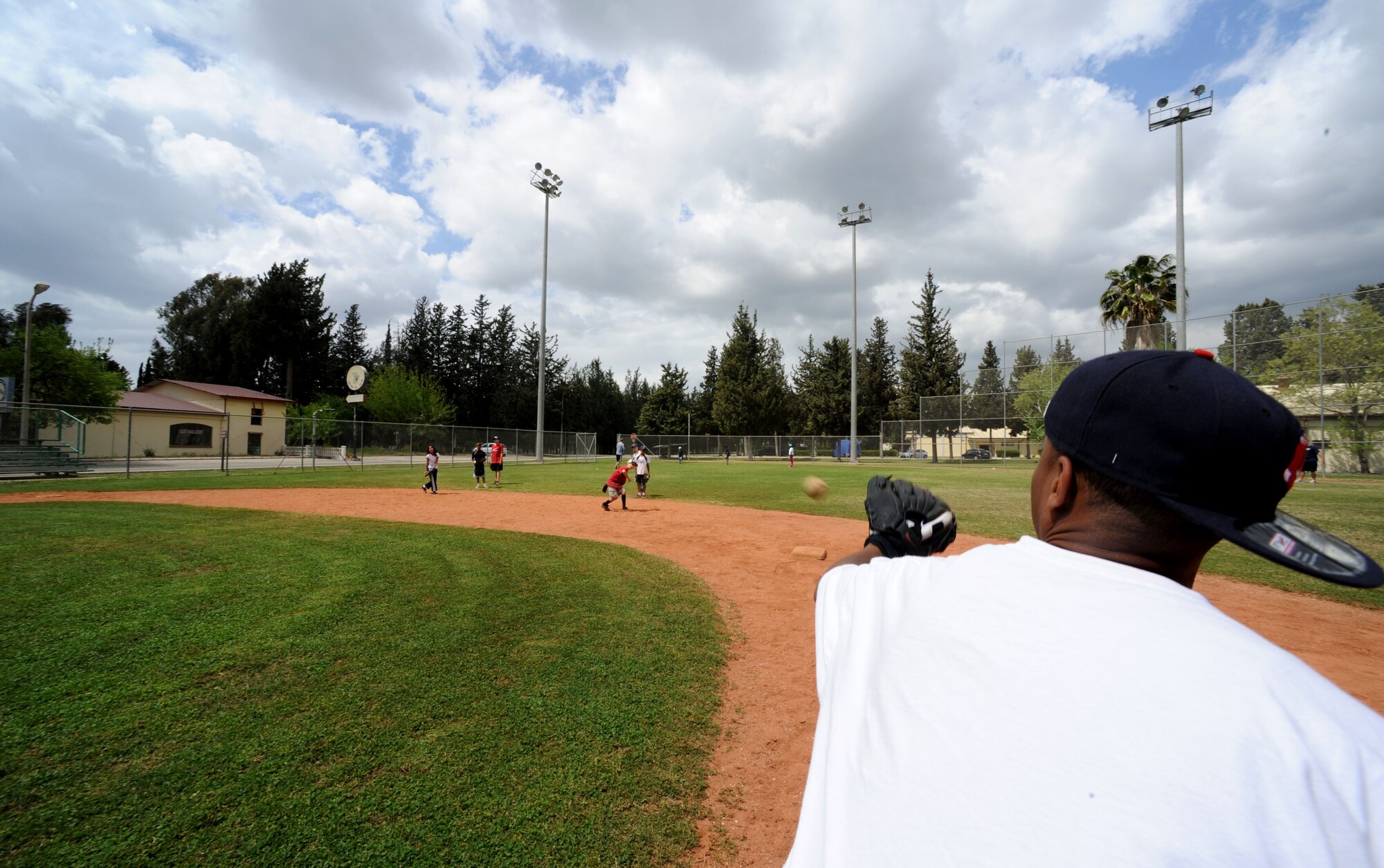 Marcus Prentiss, 39th Communications Squadron, catches a ball during baseball spring training camp April 10, 2012, at Incirlik Air Base, Turkey. The training was held to prepare players ages 9-18 for the Youth Center Baseball Tournament, which kicks off April 21. (U.S. Air Force photo by Senior Airman Jarvie Z. Wallace/Released) 