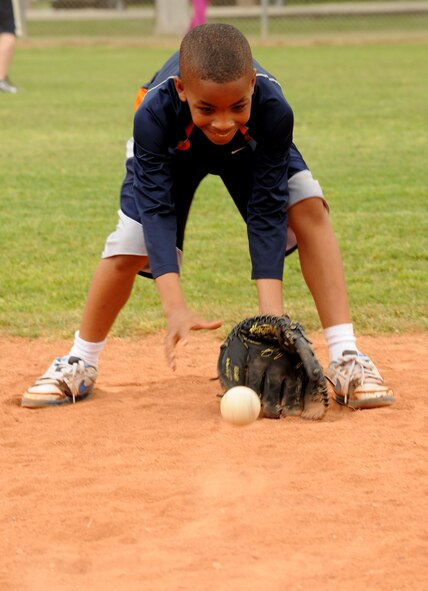 A player fields a ground ball during baseball spring training camp April 10, 2012, at Incirlik Air Base, Turkey. The training was held to prepare players ages 9-18 for the Youth Center Baseball Tournament, which kicks off April 21. (U.S. Air Force photo by Senior Airman Jarvie Z. Wallace/Released) 