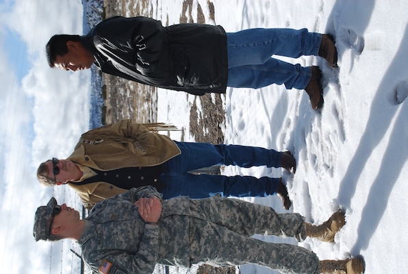 SANTA CLARA PUEBLO, N.M., -- Maj. Seth Wacker and Robert Isenberg of the Corps’ South Pacific Division’s 59th Forward Engineering Support Team – Advanced (center), visit a freshwater site at Santa Clara Pueblo and meet with Adrian Garcia, a Santa Clara tribal member.