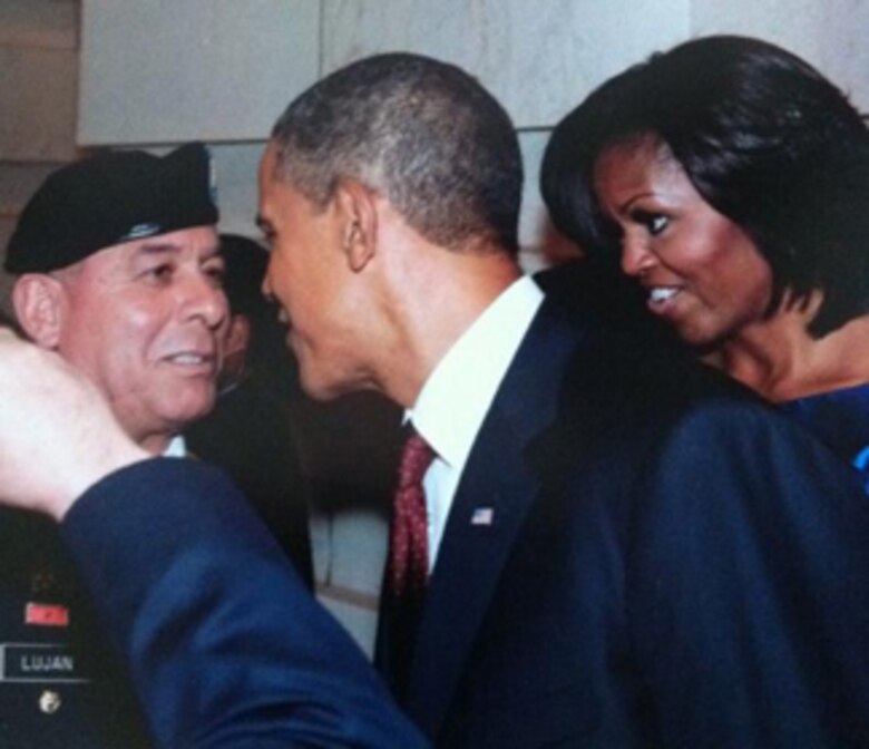 WASHINGTON D.C., -- District employee MSG Lujan gets a photo with the President and First Lady after the 2012 State of the Union Address.