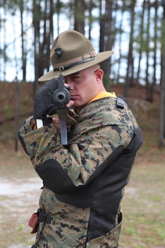 Gunnery Sgt. Joshua A. Peterson, one of the top shots for the Marine Corps Shooting Team, practices his aim by ‘snapping in’ at the Stone Bay Ranges aboard Marine Corps Base Camp Lejeune, April 13. The rifle he uses is specially weighted and requires endurance and careful attention to detail to achieve proper bone support.