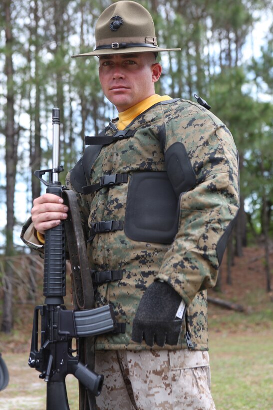 Gunnery Sgt. Joshua A. Peterson, a member of the Marine Corps Shooting Team, dropped only twelve out of 600 points in a recent competition at the Stone Bay ranges aboard Marine Corps Base Camp Lejeune. His exceptional shooting and regular work on the range are aided by specially designed shooting gear and a custom rifle.