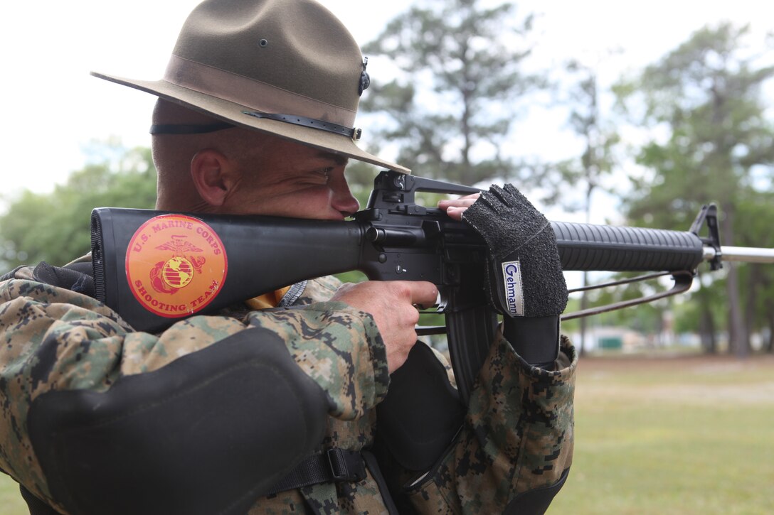 Gunnery Sgt. Joshua A. Peterson, one of the top shots for the Marine Corps Shooting Team, practices his aim by ‘snapping in’ at the Stone Bay Ranges aboard Marine Corps Base Camp Lejeune, April 13. The rifle he uses is specially weighted and requires endurance and careful attention to detail to achieve proper bone support.