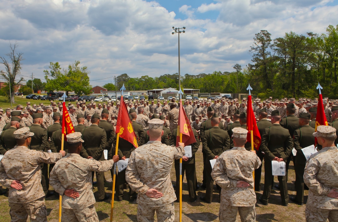 Marines with 3rd Battalion, 6th Marine Regiment, 2nd Marine Division, stand in a school circle and listen to their battalion commander, Lt. Col. James A. Ryans. Ryans welcomed the newest members of his unit after a French Fourragere presentation ceremony April 13. Thirty-one Marines were presented the unique and historic award during the ceremony. ::r::::n::::r::::n::The 5th and 6th Marine Regiments are the only units in the Marine Corps authorized to wear the French Fourragere. Every service member with the regiment s wears the award on their left shoulder of select uniforms for as long as they remain a member of the unit. The two regiments were awarded the combat decoration after their participation in three significant battles during World War I: the Battle of Belleau Wood, Battle of Soissons, and the Battle of Champagne. ::r::::n::::r::::n::The regiments’ victories contributed to the opening of the western approaches to the Argonne Forest, where American expeditionary forces partnered with their allies to launch their last offensive of the war.