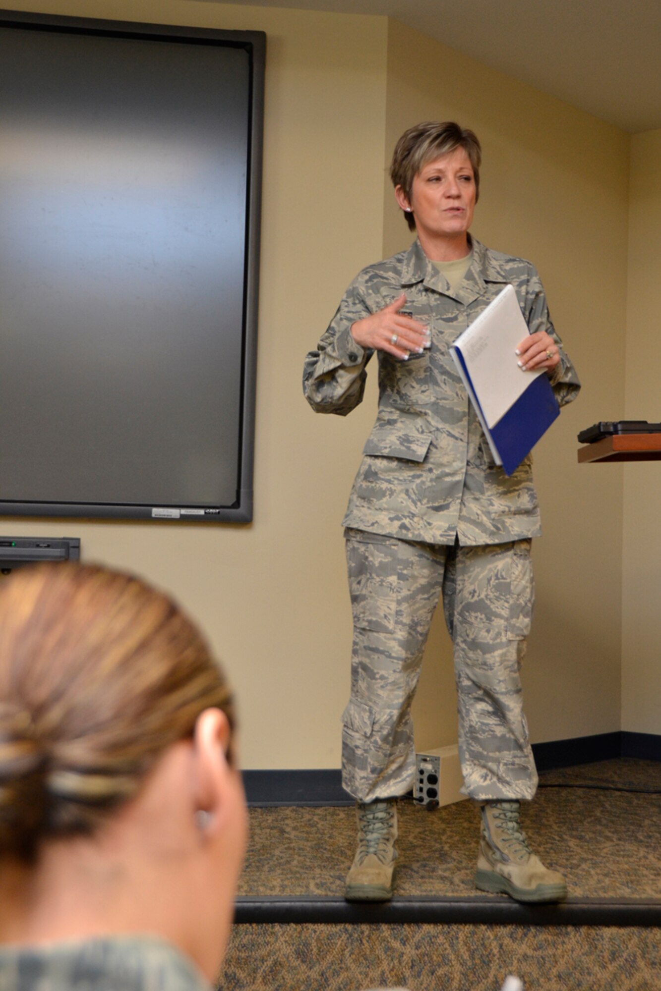 Senior Master Sgt. Joyce Hughes, Dobbins Top 3 president, discusses upcoming events such as the SNCO/NCO Induction and Community College of the Air Force graduation scheduled for the April Unit training Assembly at the Dobbins Top 3 meeting March 3.