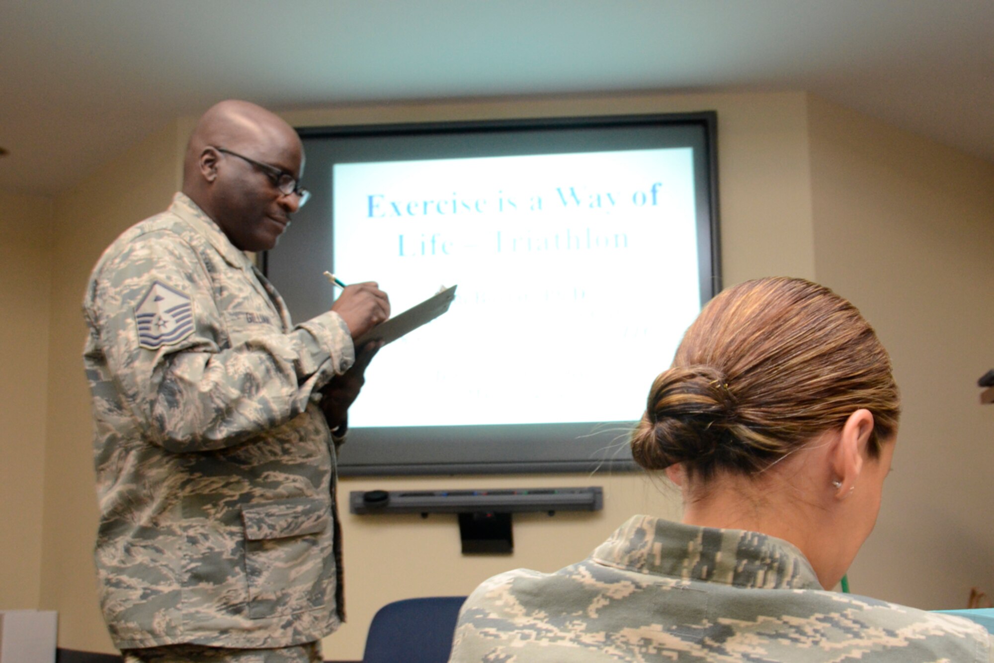 Senior NCOs of the 94th Airlift Wing attend the Dobbins Top 3 meeting March 3, at the 700th Airlift Squadron Auditorium. Jim Boylan, PhD, founder of Atlanta Triathlon Club and owner of Triathlon Coaching Services, LLC served as guest speaker. (U.S. Air Force photo/Master Sgt. James Branch)