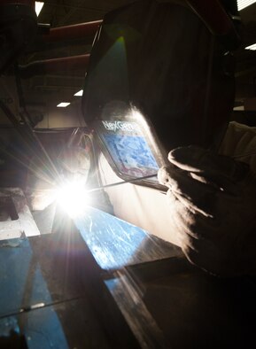Senior Airman James Chazotte, 28th Maintenance Squadron metals technology technician, repairs an aerospace ground equipment oil cart in the welding shop at Ellsworth Air Force Base, S.D., April 11, 2012. The base relies on the metals technology shop for all welding maintenance of tools and equipment needed to support base operations. (U.S. Air Force photo by Airman 1st Class Kate Thornton/Released)