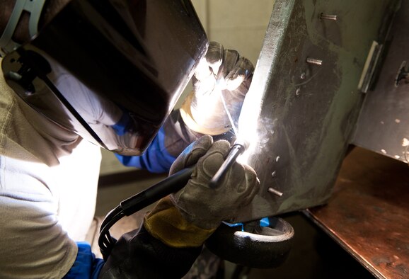 Senior Airman James Chazotte, 28th Maintenance Squadron metals technology technician, repairs an aerospace ground equipment oil cart in the welding shop at Ellsworth Air Force Base, S.D., April 11, 2012. Equipment is sent to be welded if there are no other means of maintenance on the item, making the metals technology Airmen the last line of defense in keeping the B-1 equipment mission ready. (U.S. Air Force photo by Airman 1st Class Kate Thornton/Released)