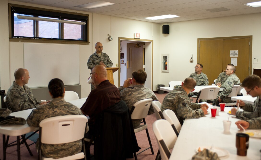 Master Sgt. Anthony Escobedo, 28th Maintenance Squadron maintenance flight superintendant, speaks to members of Ellsworth during a Prayer Breakfast at the Freedom Chapel Annex at Ellsworth Air Force Base, S.D., April 12, 2012. Each month a new speaker is asked to share a spiritually encouraging message with the group and pass on knowledge and advice. (U.S. Air Force photo by Airman 1st Class Alystria Maurer/Released)