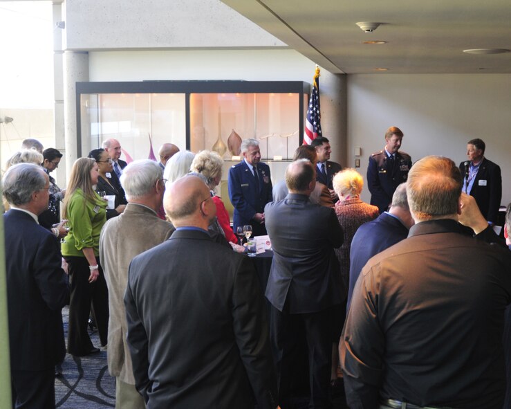 George Cargill, TriWest Healthcare Alliance Northwest vice president, introduces (from left to right) Col. Bruce Bowers, 446th Airlift Wing commander, Col. Peter Stavros, Western Air Defense Sector commander, and Col. Wyn Elder, 62nd Airlift Wing commander, to members of the Tacoma-Pierce County Chamber of Commerce April 12, 2012, at Hotel Murano in Tacoma, Wash. The chamber hosted an Air Force Commanders Reception as a way to introduce leaders of Airmen to civic leaders of the communities where their Airmen live in. (U.S. Air Force photo/Staff Sgt. Frances Kriss)