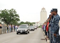 Joint Base San Antonio members salute the hearse carrying the body of Seaman
Trevor J. Stanley, of Virginia Beach, Va., April 13 at JBSA-Randolph.
Stanley was assigned to Naval Mobile Construction Battalion 3, Port Hueneme,
Calif. The motorcade exited Randolph for funeral services at Colonial
Funeral Home in Universal City. Stanley's family resides in the area. 
(U.S. Air Force photo by Melissa Peterson)