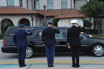 Joint Base San Antonio leaders salute the hearse transferring the body of Seaman Trevor J. Stanley, of Virginia Beach, Va., April 13 at JBSA-Randolph. Stanley was assigned to Naval Mobile Construction Battalion 3, Port Hueneme, Calif. The motorcade exited Randolph for funeral services at Colonial Funeral Home in Universal City. Stanley's family resides in the area. (U.S. Air Force photo by Joel Martinez)
