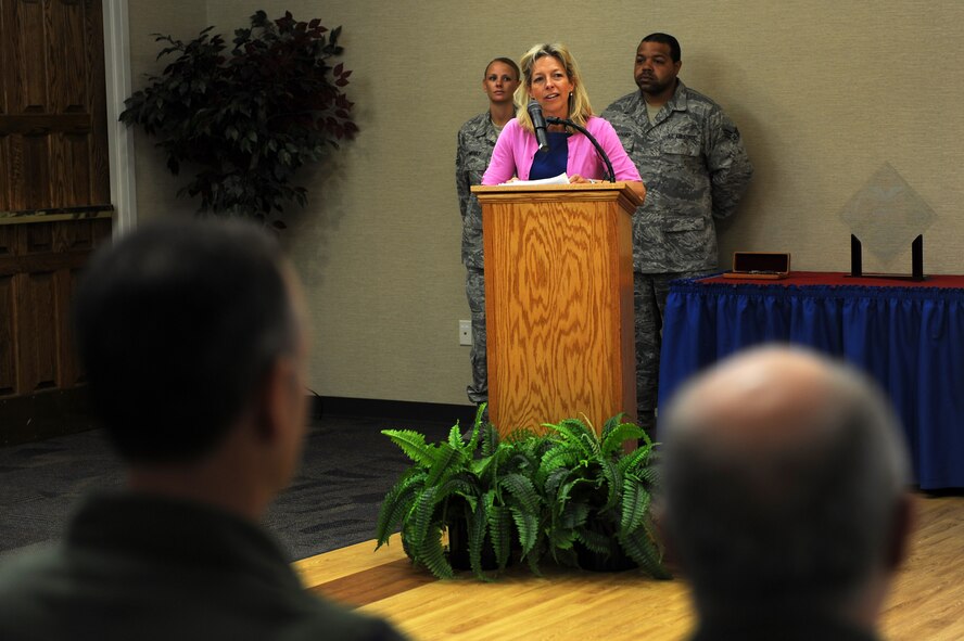 Colleen Shine, speaks at an awards ceremony at Moody Air Force Base, Ga., April 12, 2012. Shine is the daughter of U.S. Air Force Lt. Col. Anthony Shine, a fighter pilot whose jet was shot down over Vietnam in 1972. (U.S. Air Force photo by Staff Sgt. Ciara Wymbs/Released) 