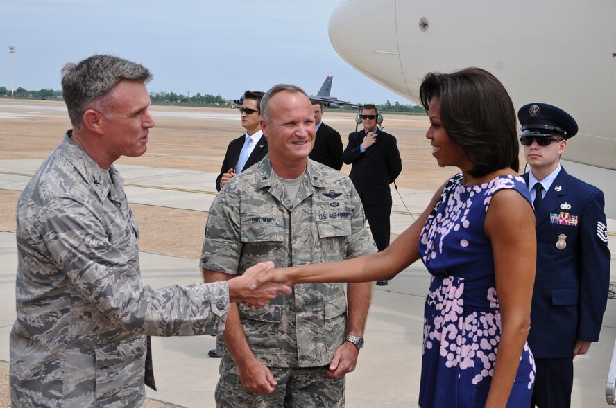 Col. Robert Gass, 8th Air Force vice commander, shakes Michelle Obama's hand on Barksdale Air Force Base, La., April 12. The First Lady visited the local area to celebrate the first anniversary of the Joining Forces Campaign. The campaign was established to encourage employers to hire military veterans and their spouses. (U.S. Air Force photo/Airman 1st Class Micaiah Anthony)(RELEASED)