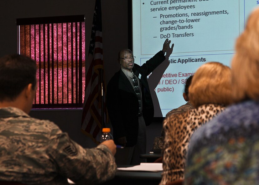 Alvin L. Dennis, a retired U.S. Air Force Tech. Sgt., instructs military and civilian personnel on how to correctly write and submit a federal resume, April 12, 2012. Dennis works as a civilian human resources manager at Wright- Patterson Air Force Base’s Airman and Family Readiness office, but also travels to numerous Air Force Reserve bases to educate both groups and individuals on how to properly apply for federal and civilian employment.  Several resume workshops are held this upcoming UTA weekend at the 32nd Aerial Port Squadron, building 130. For more information, please contact Maj. Tanaka Dunn by email; tanaka.dunn@us.af.mil. (U.S. Air Force photo by Tech. Sgt. Ralph van Houtem/ Released)