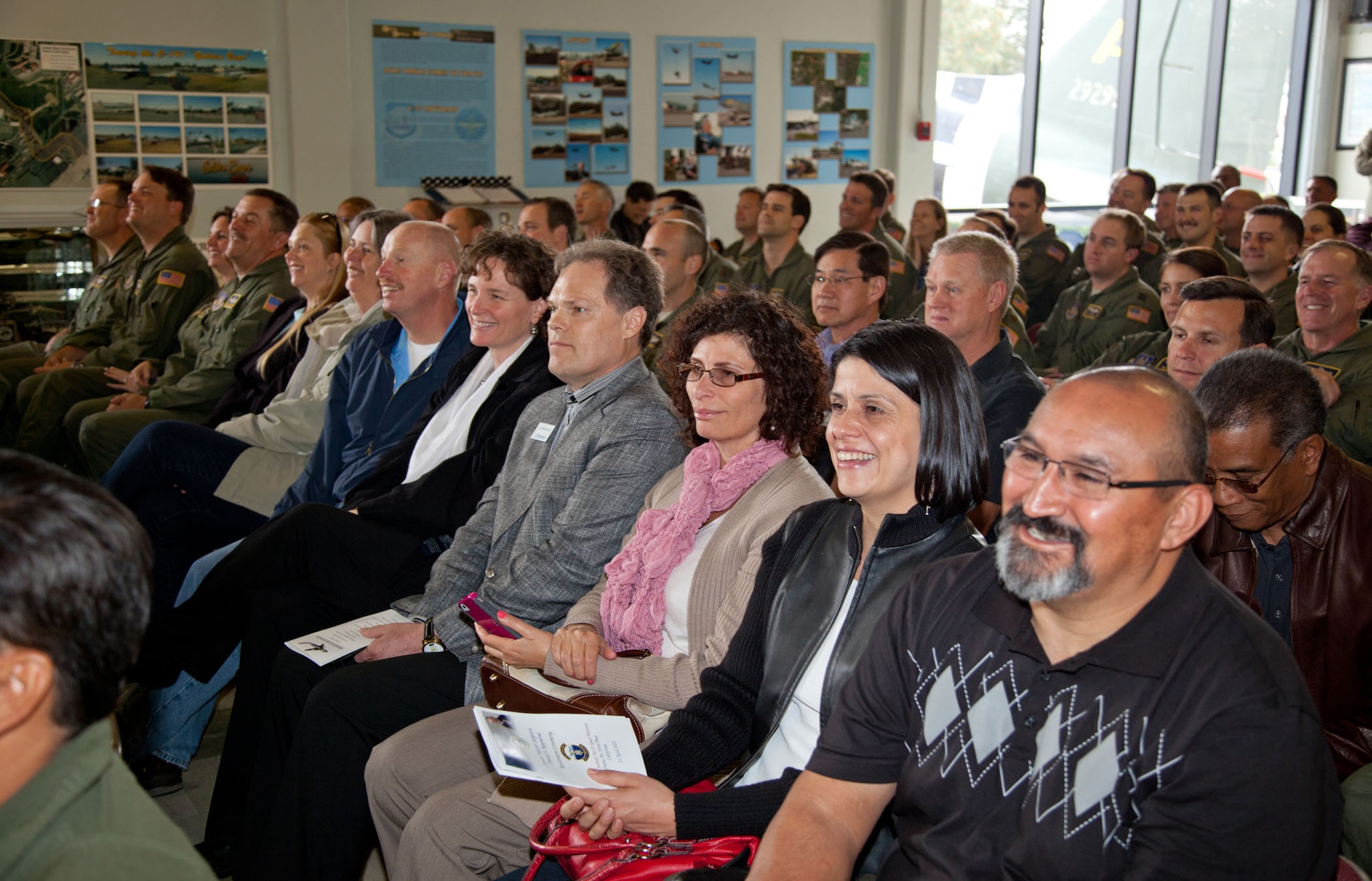TRAVIS AIR FORCE BASE, Calif. -- Family and friends of Senior Master Sgt. David Raymond celebrate his 40 years of service in the U.S. Air Force Reserve at a retirement ceremony at Travis Air Force Base, Calif., April 11, 2012. Maj. Gen. Frank J. Padilla, Deputy Inspector General of the Air Force, presided over the ceremony honoring Raymond’s legacy as a C-5 Galaxy flight engineer with the 312th Airlift Squadron, 349th Air Mobility Wing.  Raymond began his military career as a C-141 loadmaster at Travis AFB during the Vietnam War. (U.S. Air Force photo / Lt. Col. Robert Couse-Baker)
