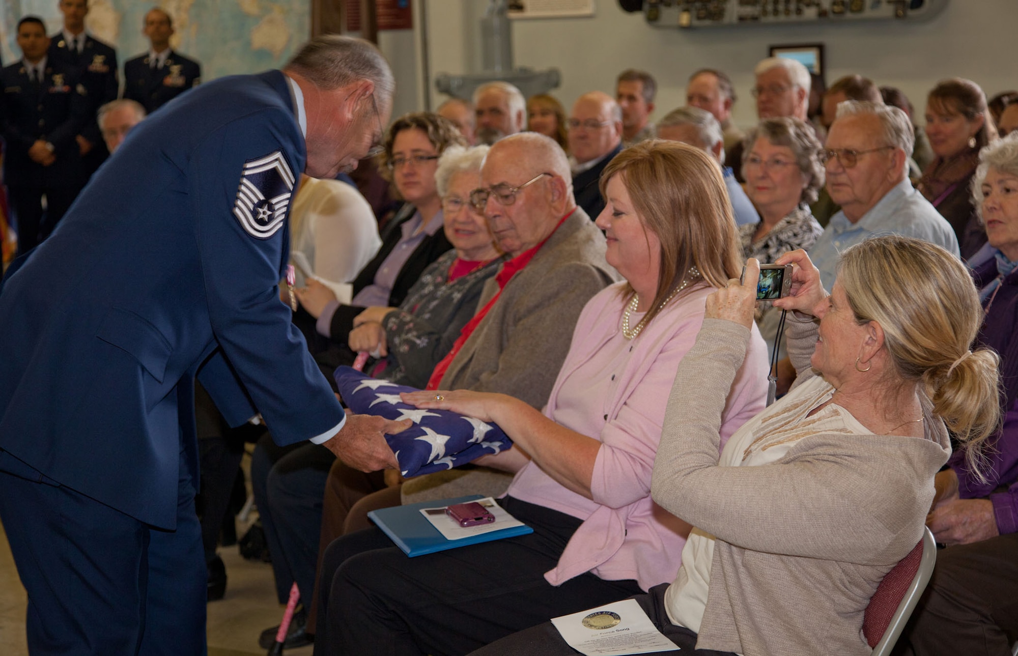 TRAVIS AIR FORCE BASE, Calif. -- Family and friends of Senior Master Sgt. David Raymond celebrate his 40 years of service in the U.S. Air Force Reserve at a retirement ceremony at Travis Air Force Base, Calif., April 11, 2012. Maj. Gen. Frank J. Padilla, Deputy Inspector General of the Air Force, presided over the ceremony honoring Raymond’s legacy as a C-5 Galaxy flight engineer with the 312th Airlift Squadron, 349th Air Mobility Wing.  Raymond began his military career as a C-141 loadmaster at Travis AFB during the Vietnam War. (U.S. Air Force photo / Lt. Col. Robert Couse-Baker)
